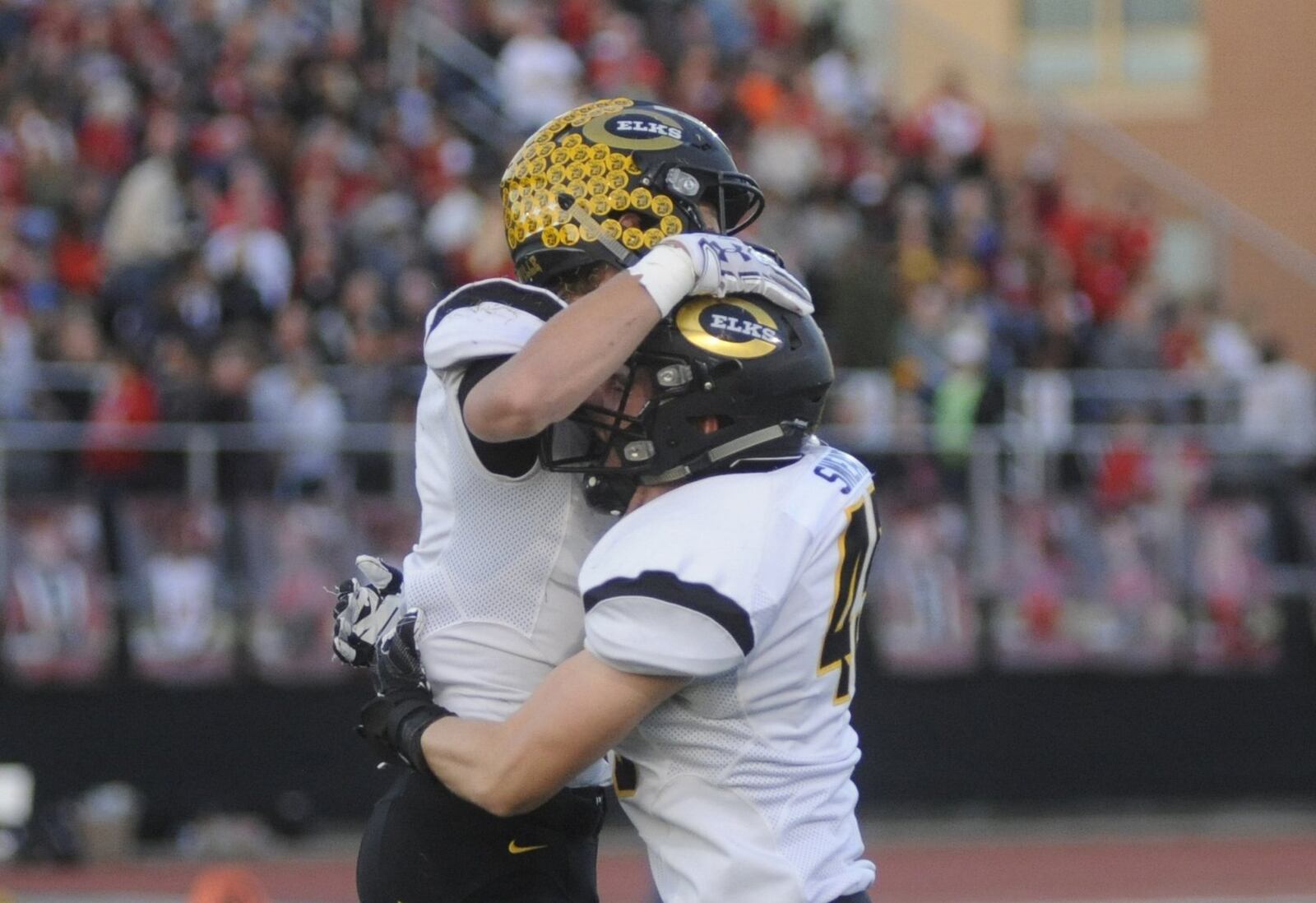 Centerville’s Riley Poulton (left) celebrates his interception with Jake Snead. Poulton also blocked a field goal attempt that was returned for a score by Ross Garrett. Centerville defeated host Wayne 39-22 in a Week 6 high school football game on Friday, Sept. 29, 2017. MARC PENDLETON / STAFF