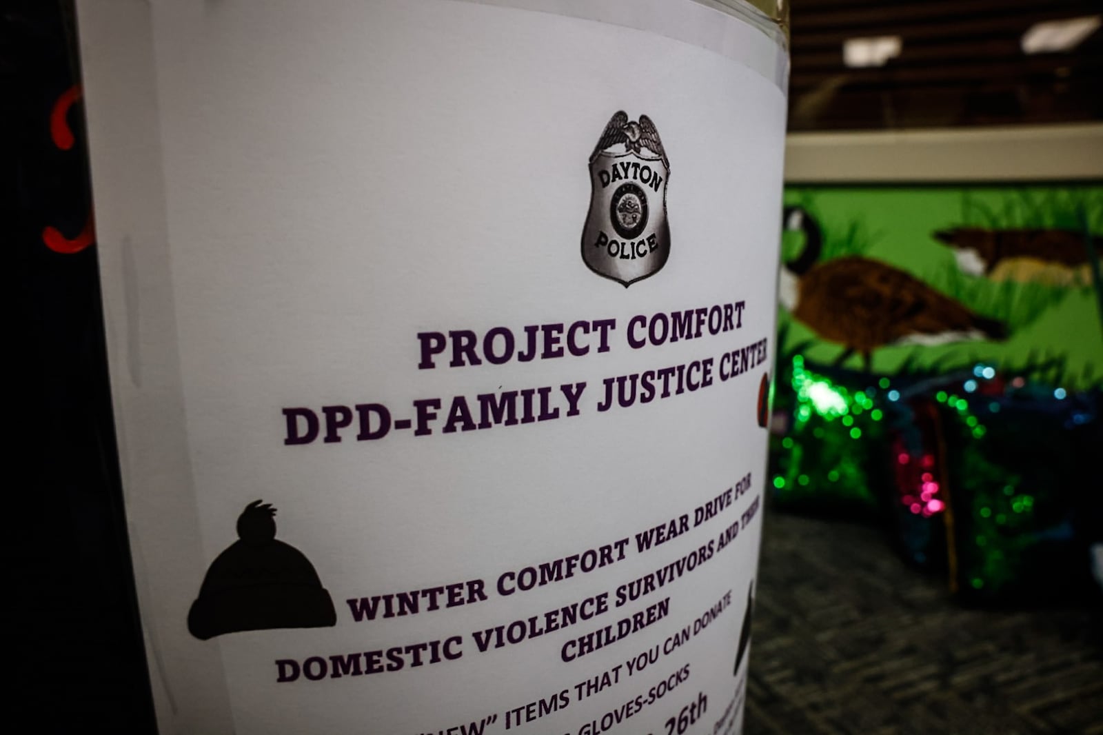 The Dayton Police Department announced a new program Monday at the Family Justice Center in Dayton to collect cold-weather clothing for survivors of domestic violence. JIM NOELKER/STAFF