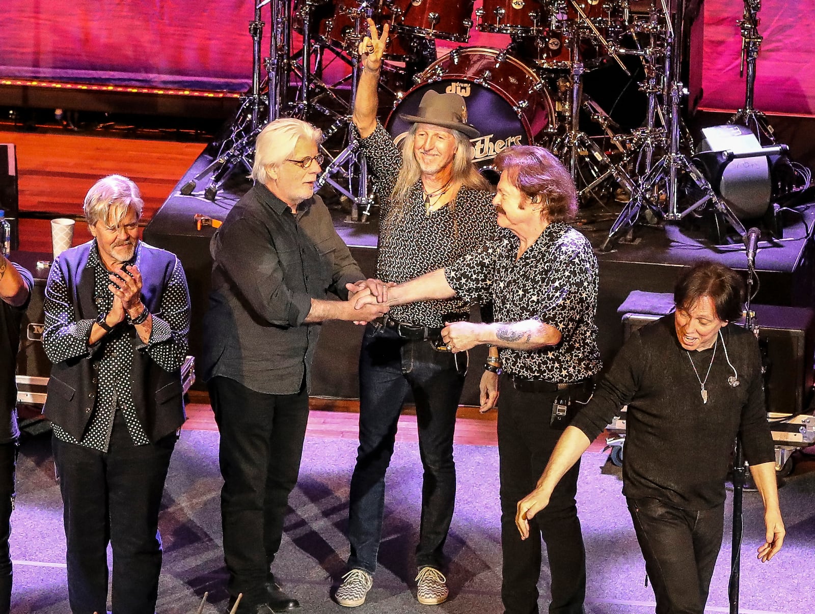 FILE - John Cowan, from left, Michael McDonald, Patrick Simmons, Tom Johnston, and John McFee of the Doobie Brothers at the Ryman Auditorium on Nov. 18, 2019, in Nashville, Tenn. (Photo by Al Wagner/Invision/AP, File)