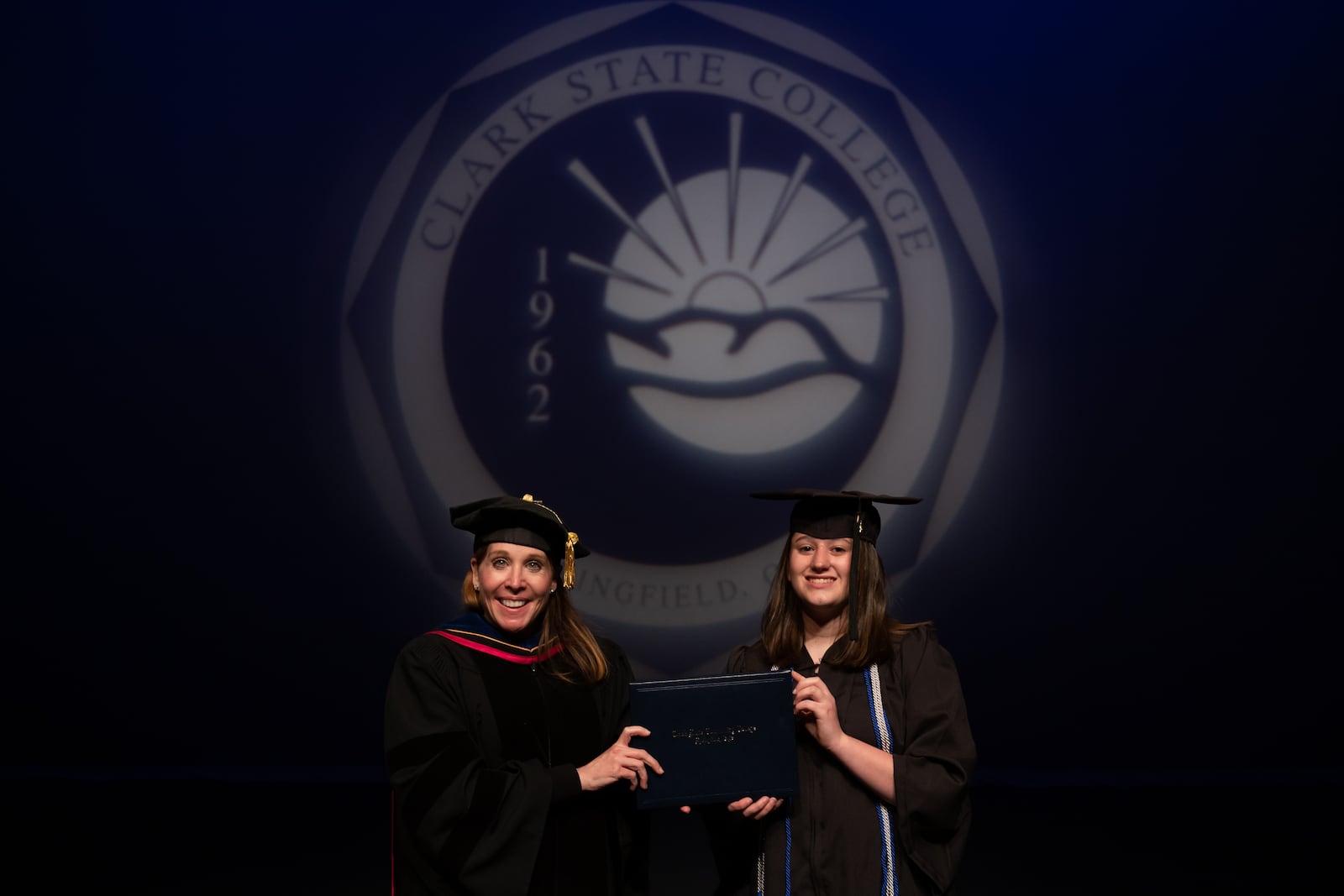 Lanna Kunzelman with Clark State President Dr. Jo Alice Blondin as she receives her associate's degree. CONTRIBUTED