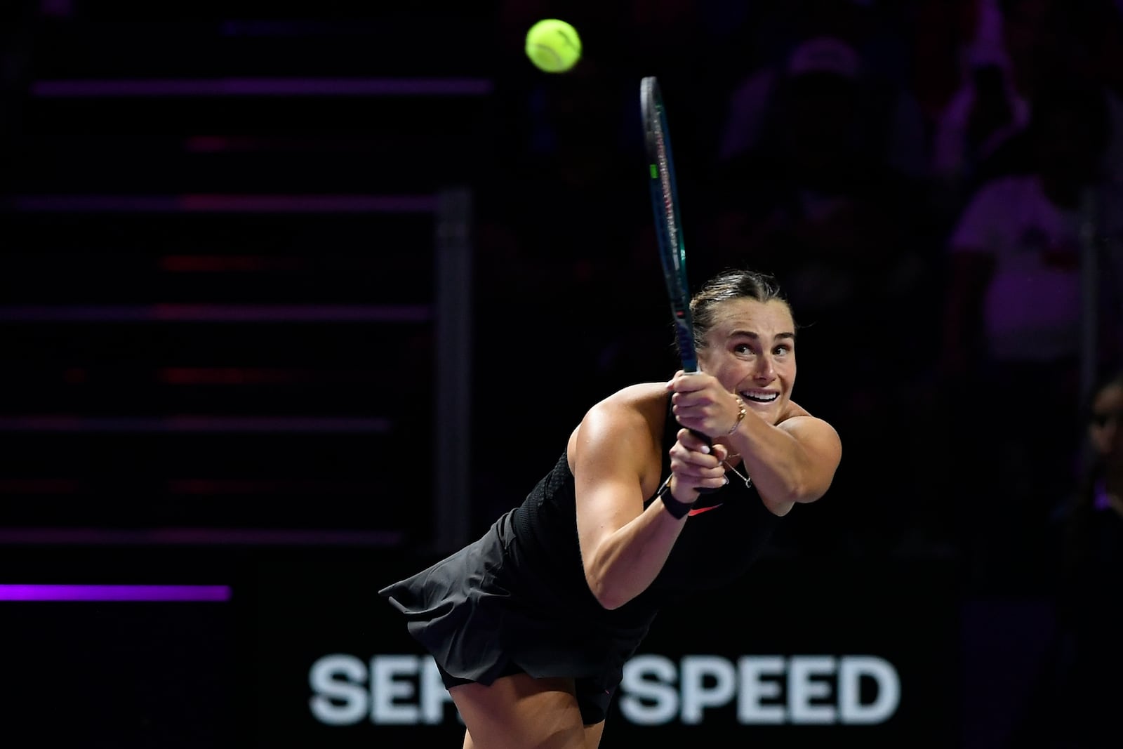 Belarus' Aryna Sabalenka in action during her women's singles semi final match against Coco Gauff of the U.S. at King Saud University Indoor Arena, in Riyadh, Saudi Arabia, Friday, Nov. 8, 2024. (AP Photo)