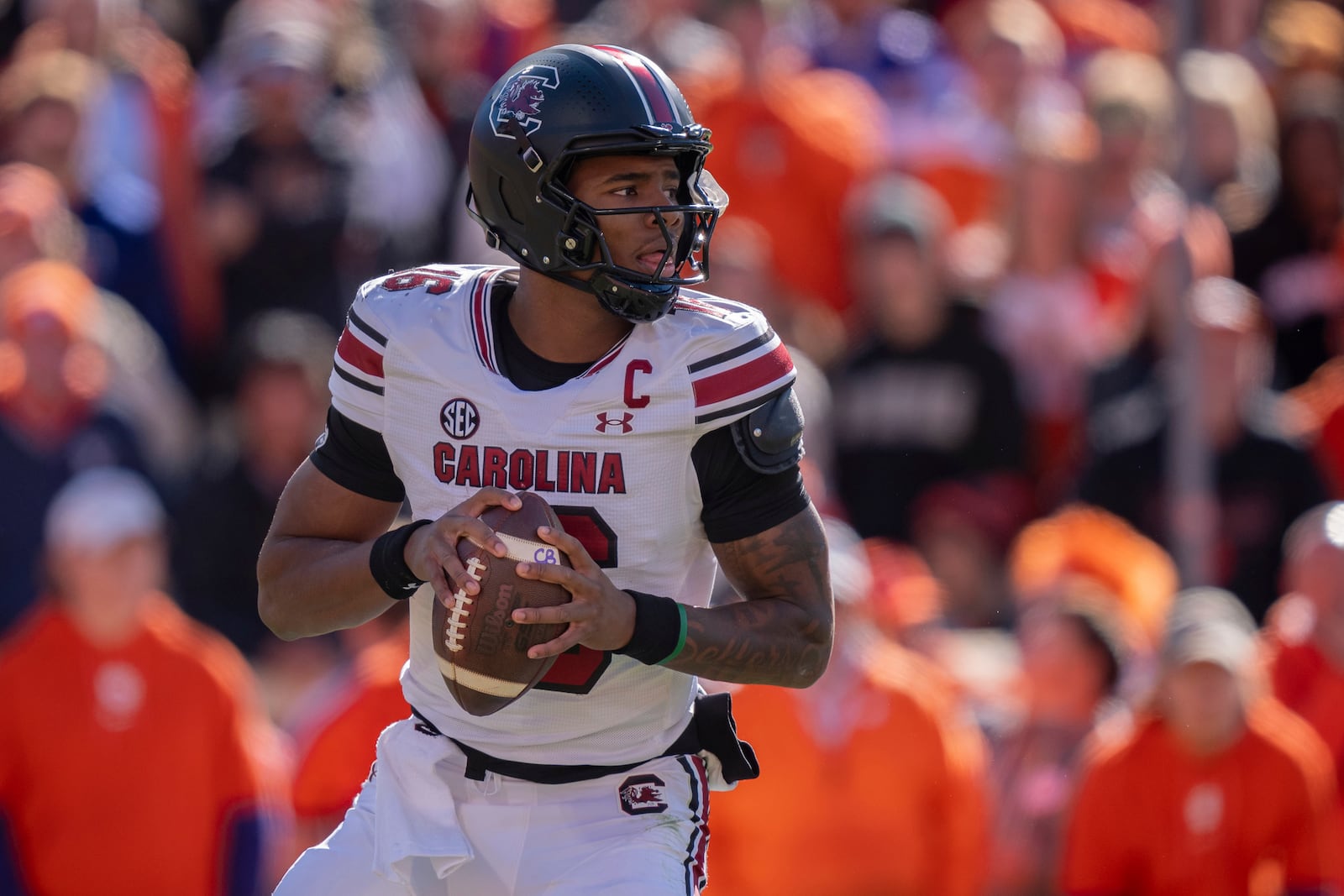 South Carolina quarterback LaNorris Sellers (16) drops back to pass in the first half of an NCAA college football game against Clemson, Saturday, Nov. 30, 2024, in Clemson, S.C. (AP Photo/Jacob Kupferman)