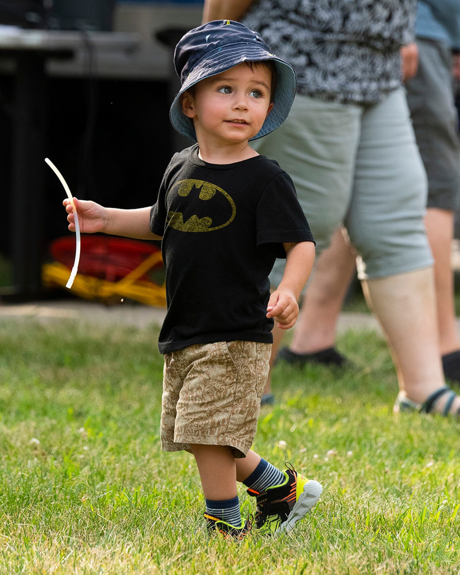 Leo, 2, son of Francisco and Capt. Tenille De La Torre, takes in the activities of a block party Aug. 12 put on by the 88th Force Support Squadron in the historic Brick Quarters housing area at Wright-Patterson Air Force Base. The event included live music, games and a food truck. U.S. AIR FORCE PHOTO/R.J. ORIEZ