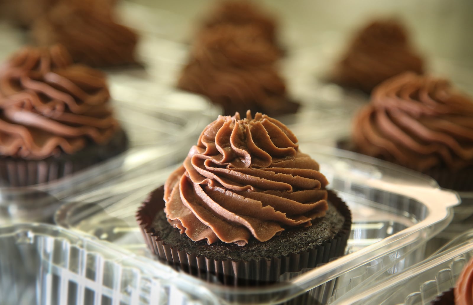 Gluten-free and vegan Dutch chocolate cupcakes from Purely Sweet Bakery. The specialty bakery makes gluten-free, vegan, paleo and keto baked goods and products. LISA POWELL / STAFF