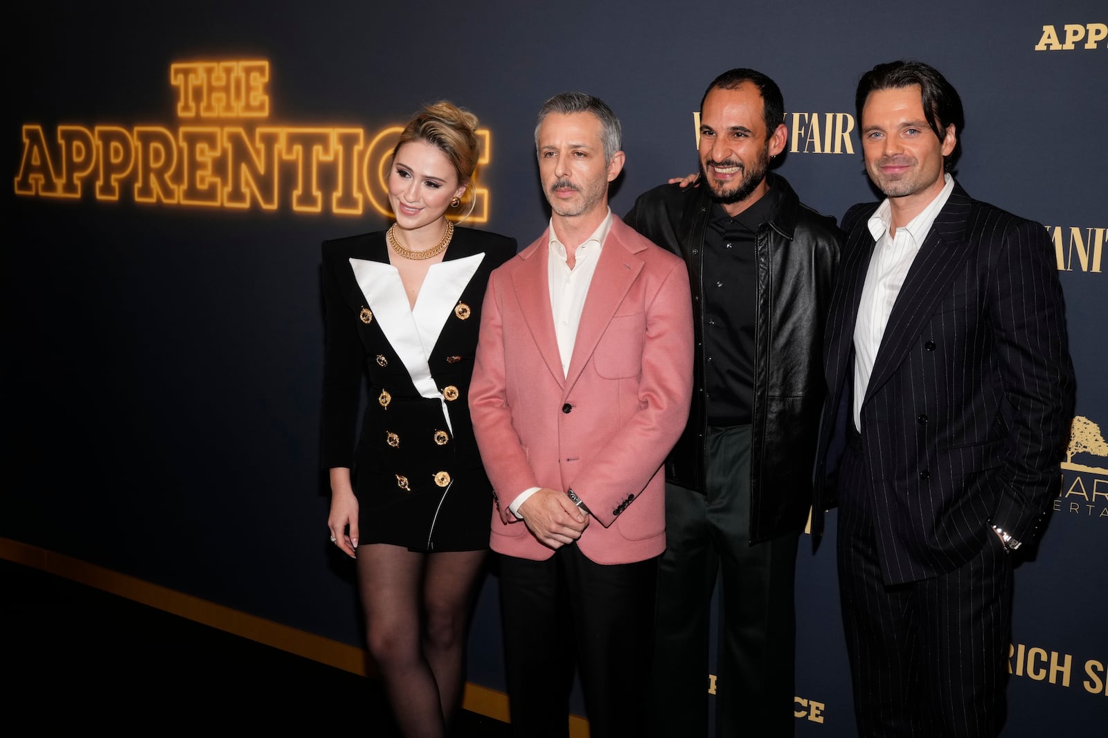 Maria Bakalova, from left, Jeremy Strong, director Ali Abbasi, and Sebastian Stan attend the premiere of "The Apprentice" at the DGA New York Theater on Tuesday, Oct. 8, 2024, in New York. (Photo by Charles Sykes/Invision/AP)