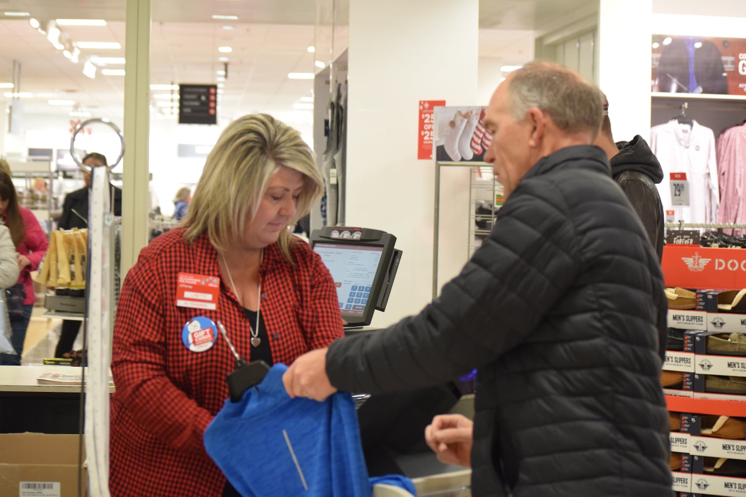 PHOTOS: Hundreds like up outside JCPenney for doorbusters, coupons