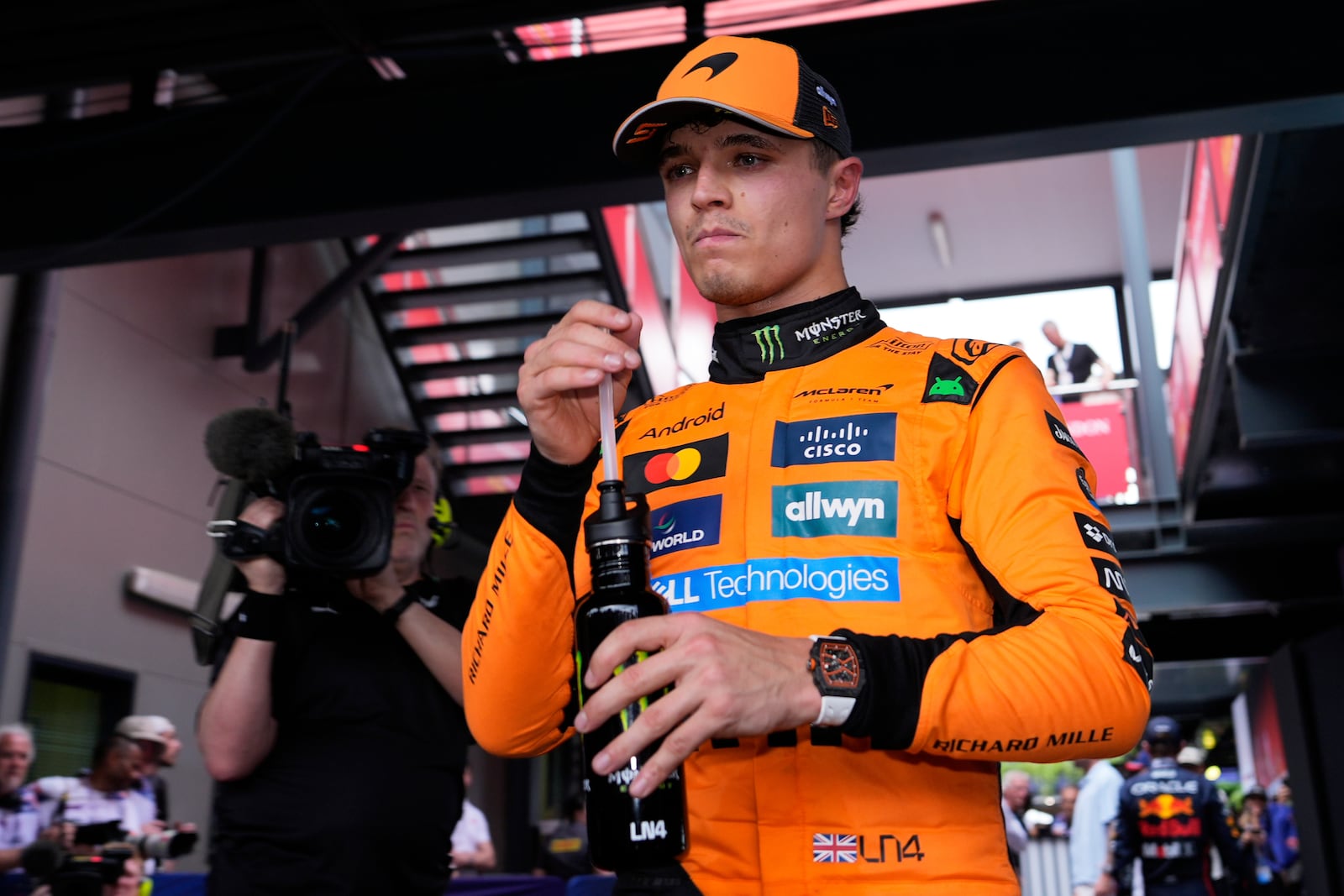 McLaren driver Lando Norris of Britain reacts after taking pole during qualifying at the Australian Formula One Grand Prix at Albert Park, in Melbourne, Australia, Saturday, March 15, 2025. (AP Photo/Asanka Brendon Ratnayake)