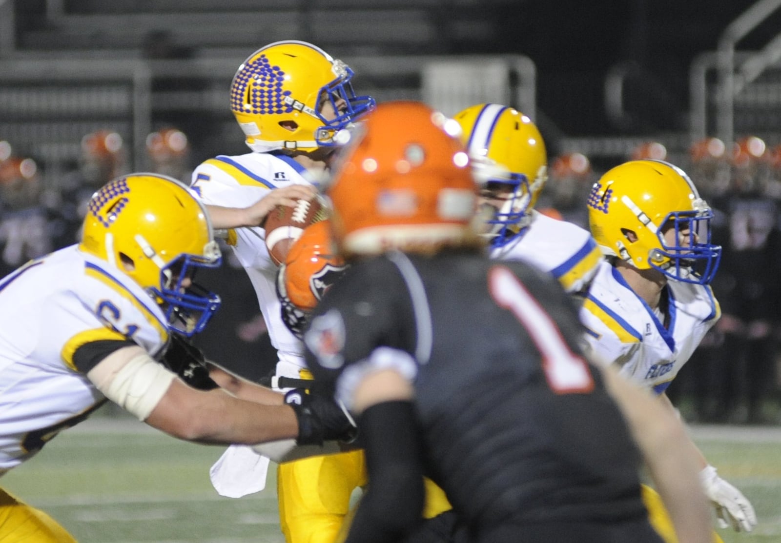 Marion Local QB Nathan Bruns completed 15 of 22 passes for 284 yards and three TDs in a 40-19 defeat of Coldwater at Sidney on Friday, Nov. 16, 2018. MARC PENDLETON / STAFF