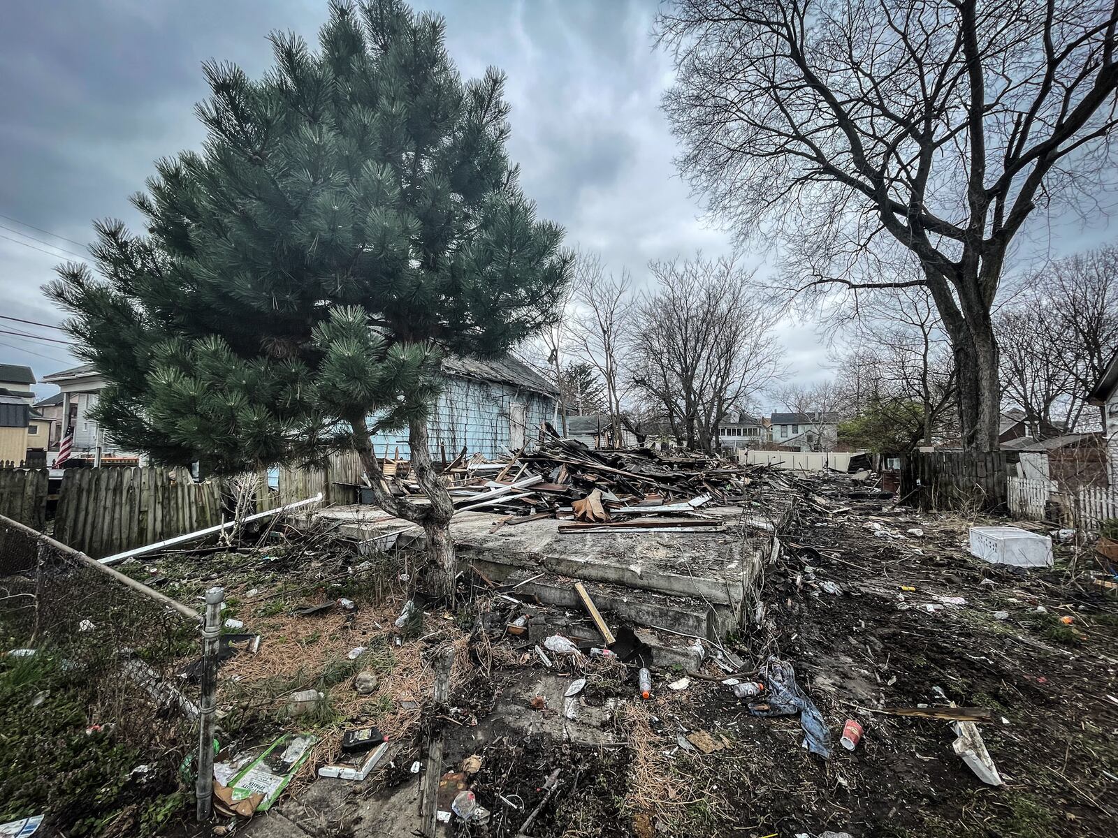 An emergency demolition was ordered for the house at 21 N. Jersey St. in Dayton after it was destroyed by a fire Tuesday night, March 26, 2024, that an arson investigator determined was intentionally set. JIM NOELKER/STAFF