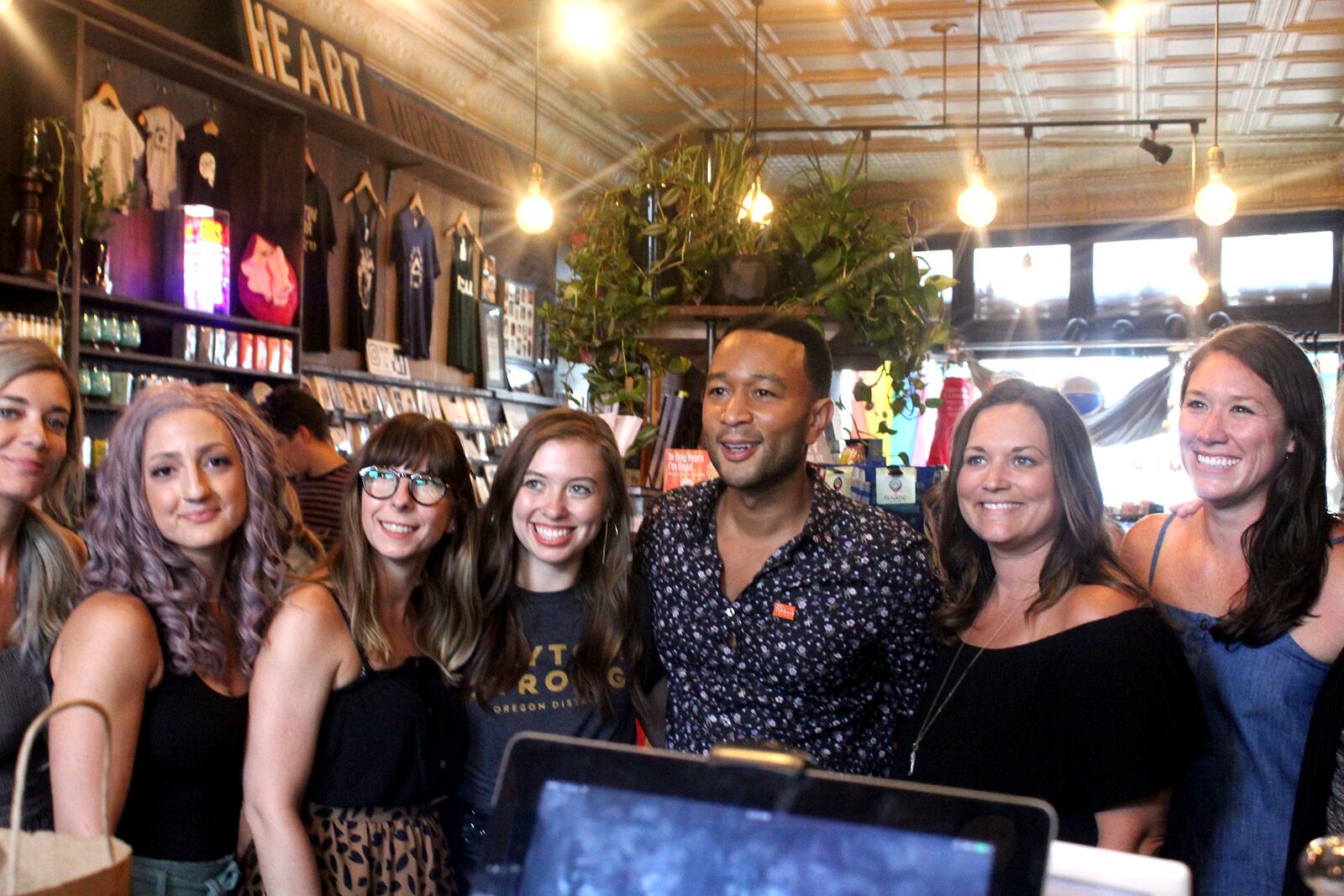 John Legend made a surprise visit to the Oregon District Sunday evening with Dayton Mayor Nan Whaley to show support in the aftermath of the mass shooting Sunday, Aug. 4. He stopped by a number of stores to shop including Heart Mercantile, Brim on Fifth, Puff Apothecary and Beck + Call. AMELIA ROBINSON / STAFF