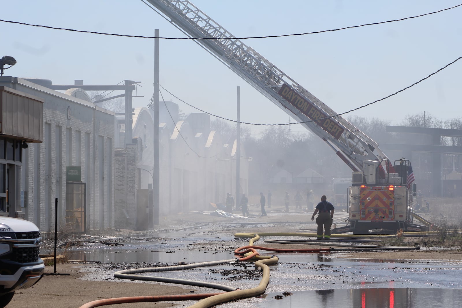 Dayton firefighters at the scene of a fire at the historic Wright brothers factory site in West Dayton on Sunday, March 26, 2023. CORNELIUS FROLIK / STAFF