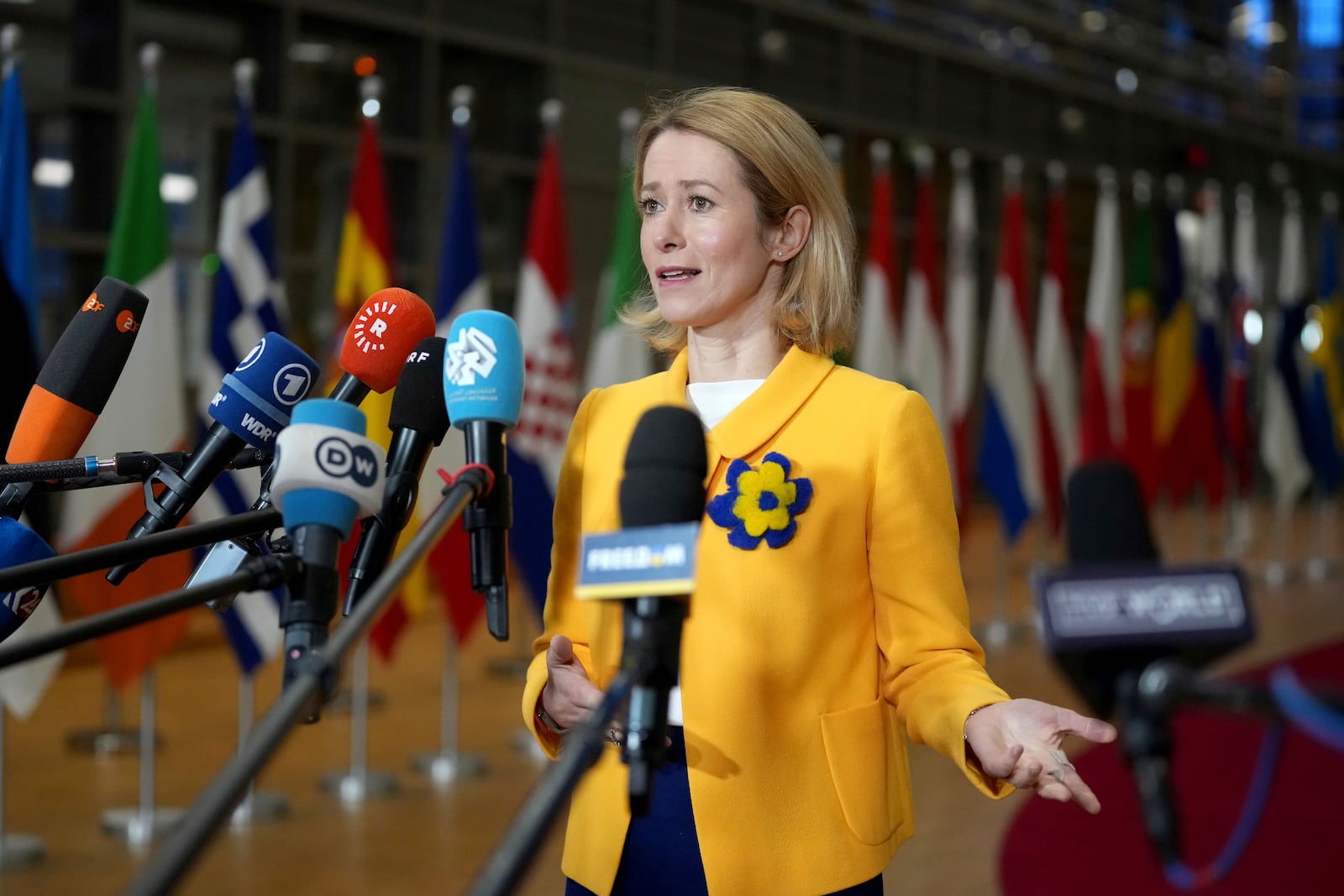 European Union foreign policy chief Kaja Kallas speaks with the media as she arrives for a meeting of EU foreign ministers at the European Council building in Brussels, Monday, Feb. 24, 2025. (AP Photo/Virginia Mayo)