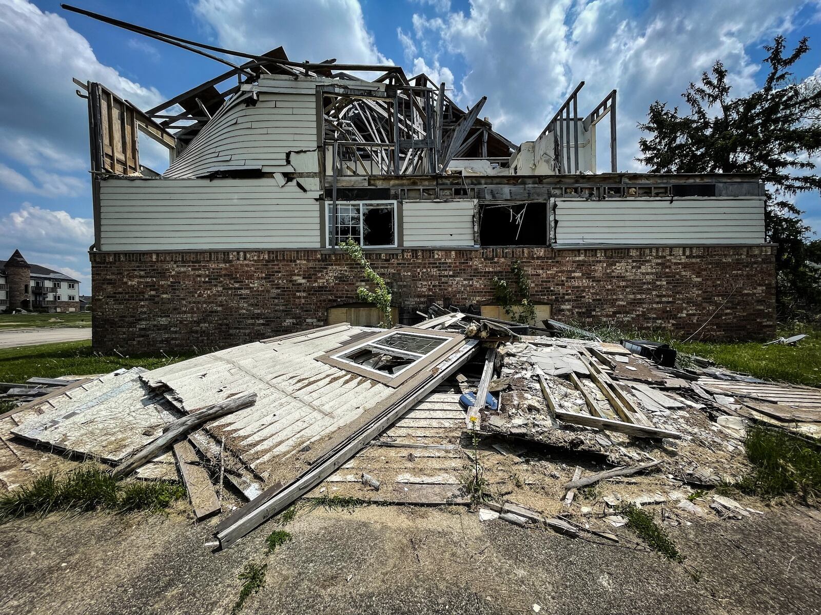 The Woodland Hills Apartments in Trotwood remain in ruins two years after the 2019 Memorial Day tornado. Hundreds of people  were displaced many leaving their belongings behind. JIM NOELKER/STAFF