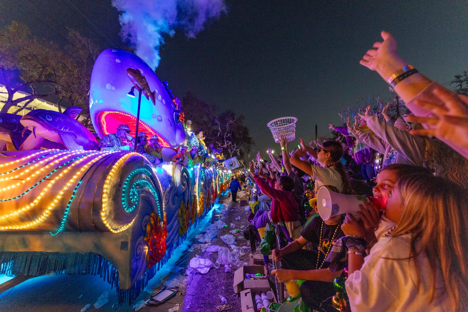 "Louisiana Fairs and Festivals" is the theme as the Krewe of Bacchus rolls through the streets of New Orleans, Sunday, March 2, 2025. (Chris Granger/The Times-Picayune/The New Orleans Advocate via AP)