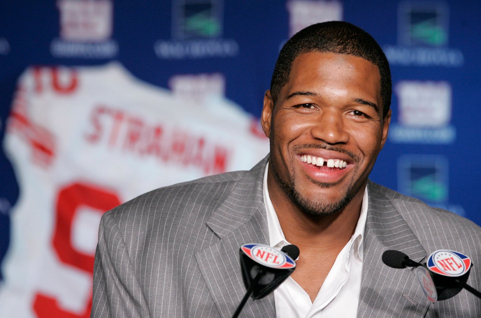 FILE - New York Giants Michael Strahan talks about his retirement from football during a news conference at Giants Stadium in East Rutherford, N.J., Tuesday, June 10, 2008. (AP Photo/Mike Derer, File)