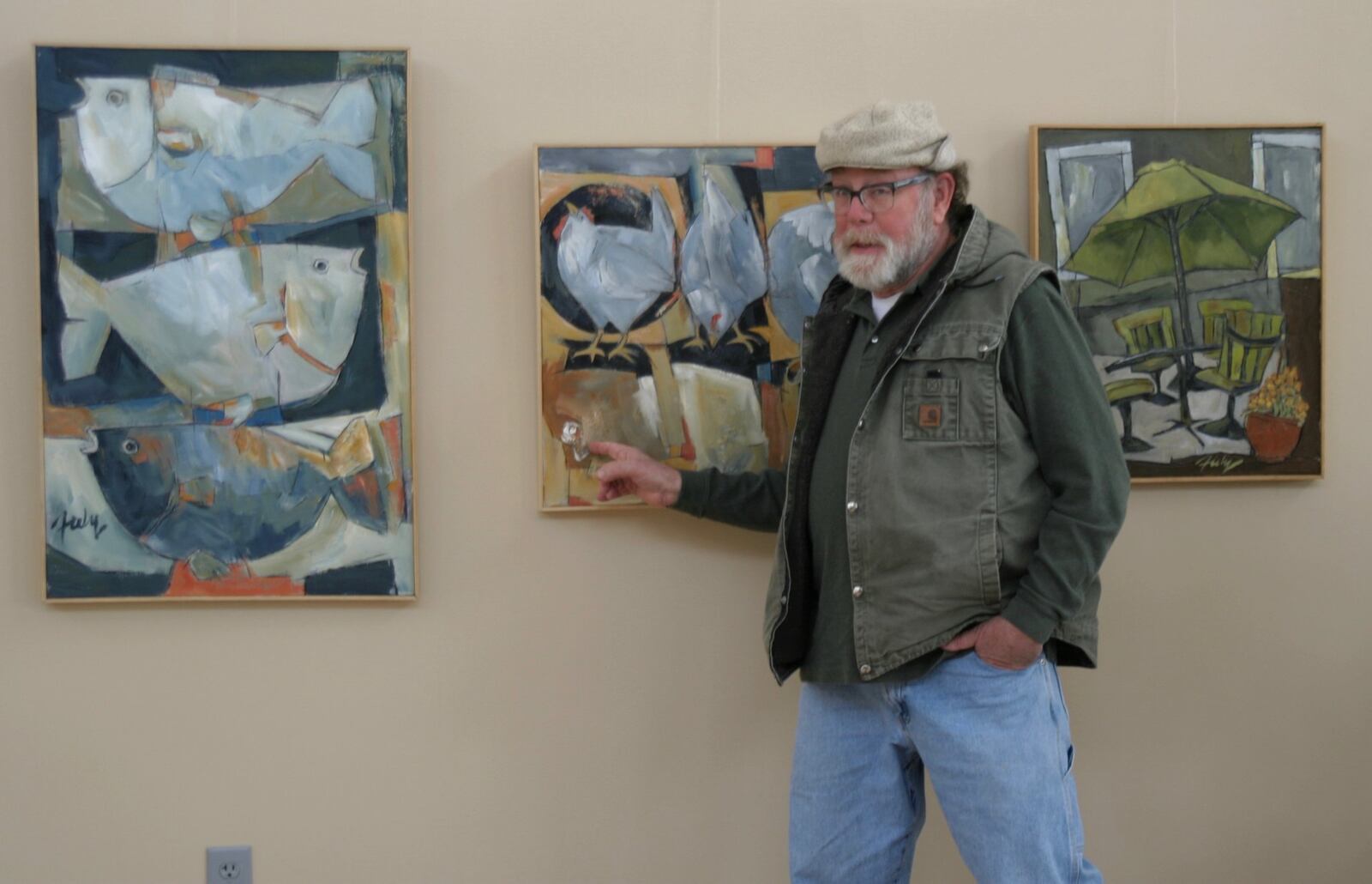 Doug Fiely, seen here discussing his work at The Art Gallery at the Centerville Police Department in 2017, died Sept. 11. He was 74. CONTRIBUTED