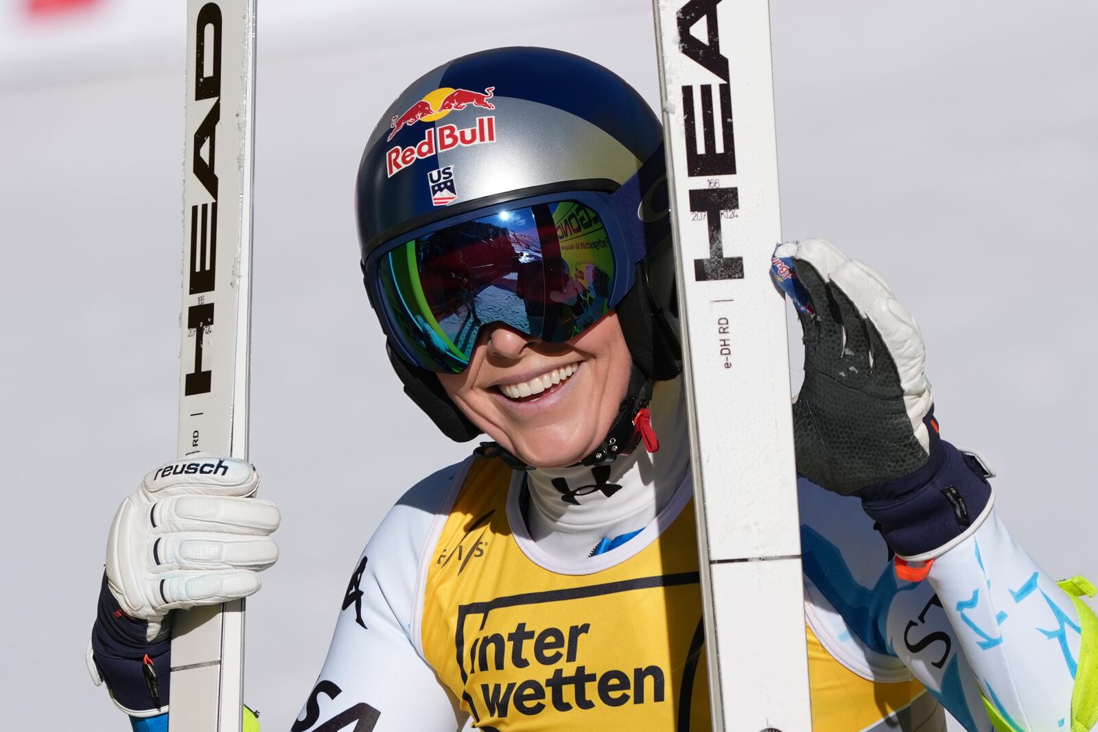 United States' Lindsey Vonn smiles at the finish area of a women's downhill race, at the Alpine Ski World Championships, in Saalbach-Hinterglemm, Austria, Saturday, Feb. 8, 2025. (AP Photo/Giovanni Auletta)