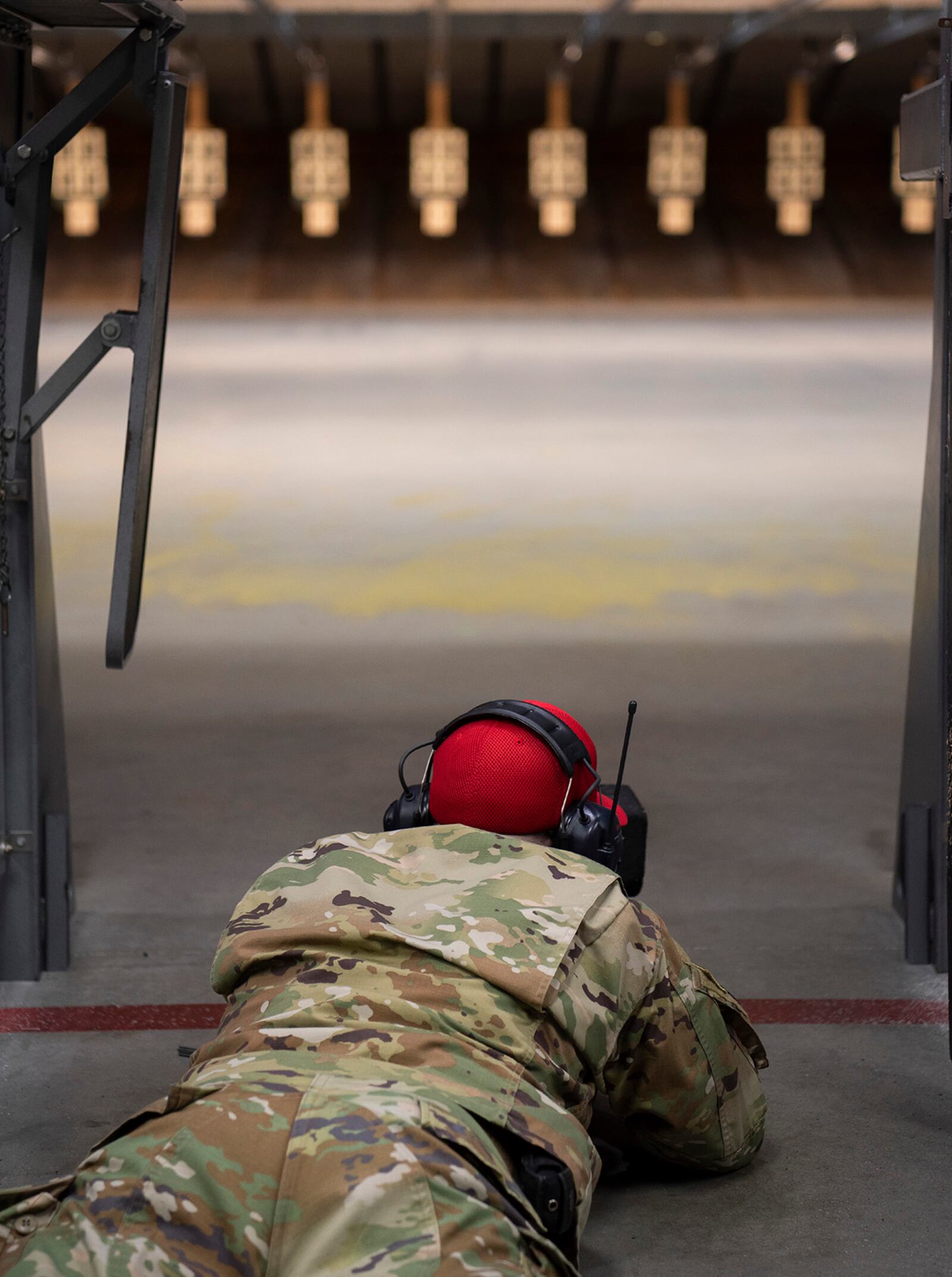 A member of the 88th Security Forces Squadron takes aim May 11 at the unit’s indoor shooting range on Wright-Patterson Air Force Base. U.S. AIR FORCE PHOTO/R.J. ORIEZ