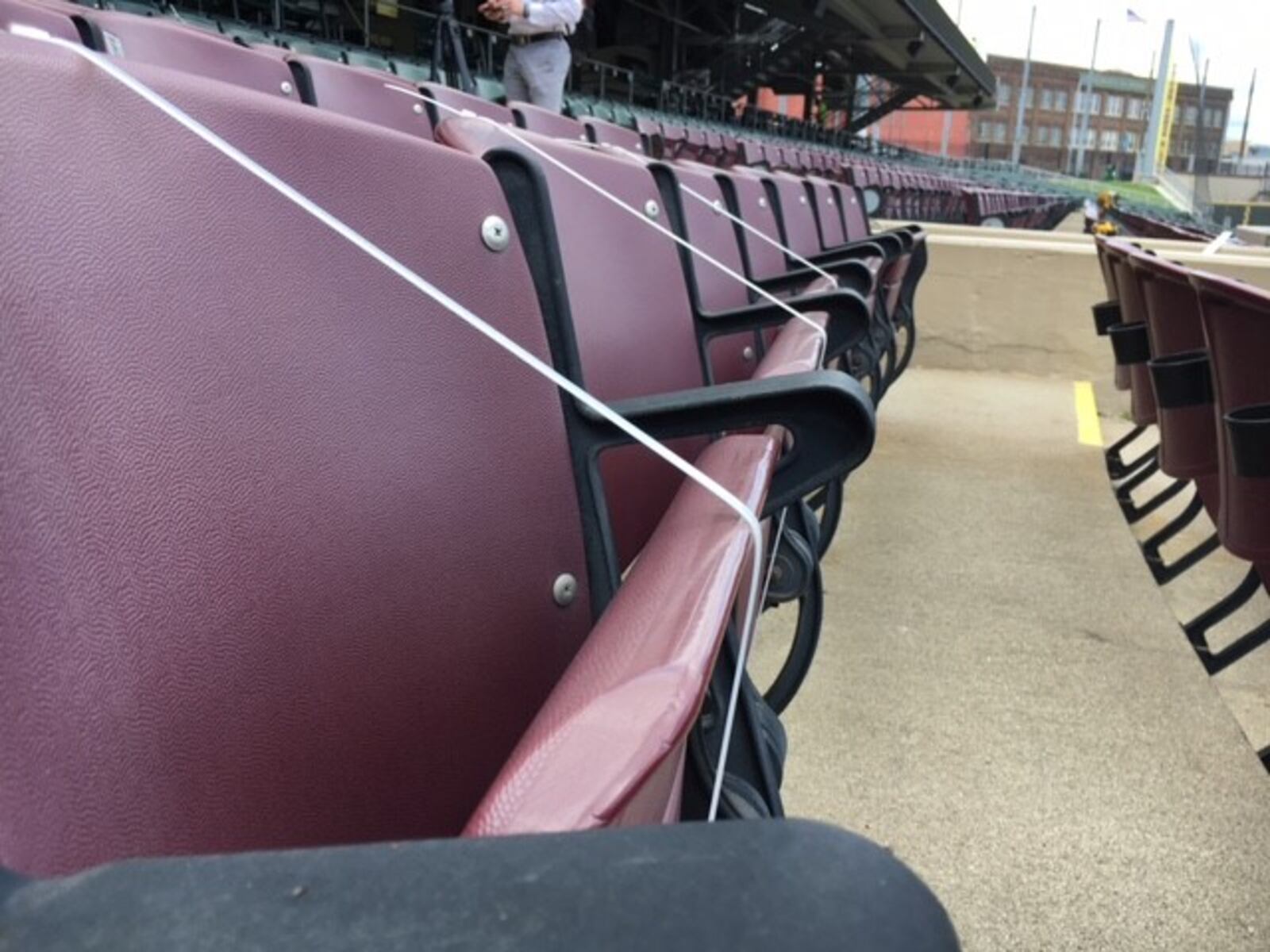 Seats have been tied off at Day Air Ballpark to make social distancing possible. THOMAS GNAU/STAFF