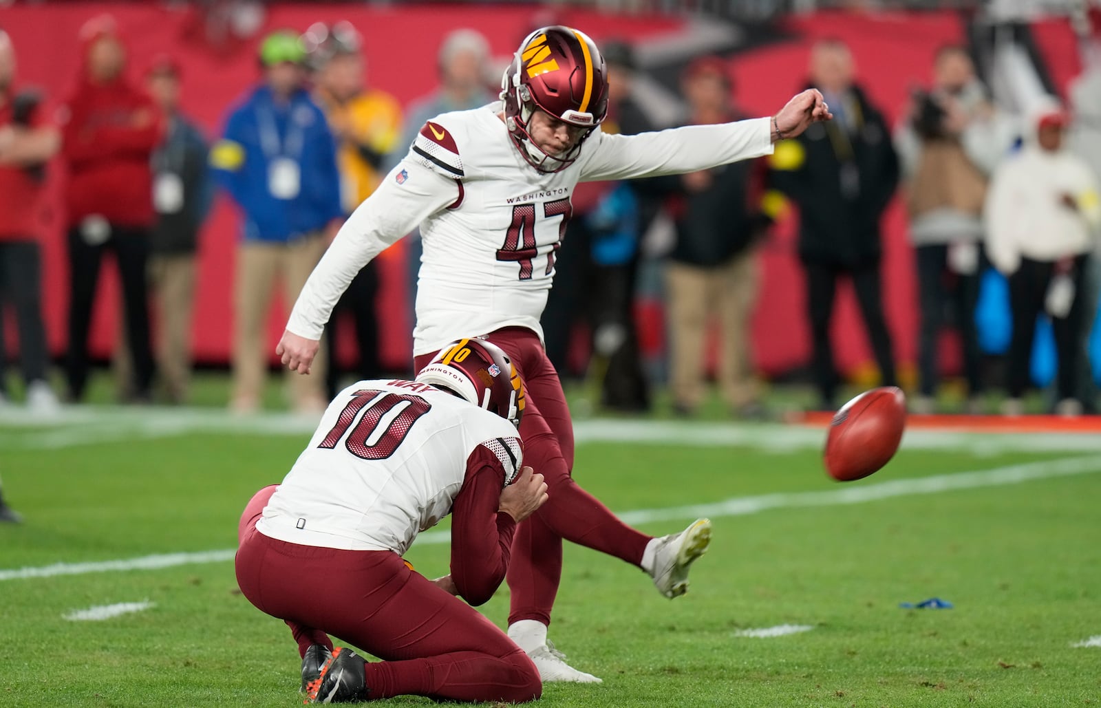 FILE - Washington Commanders' Zane Gonzalez (47) kicks a field goal against the Tampa Bay Buccaneers during an NFL wild-card playoff football game, Jan. 12, 2025, in Tampa, Fla. (AP Photo/Chris O'Meara, File)