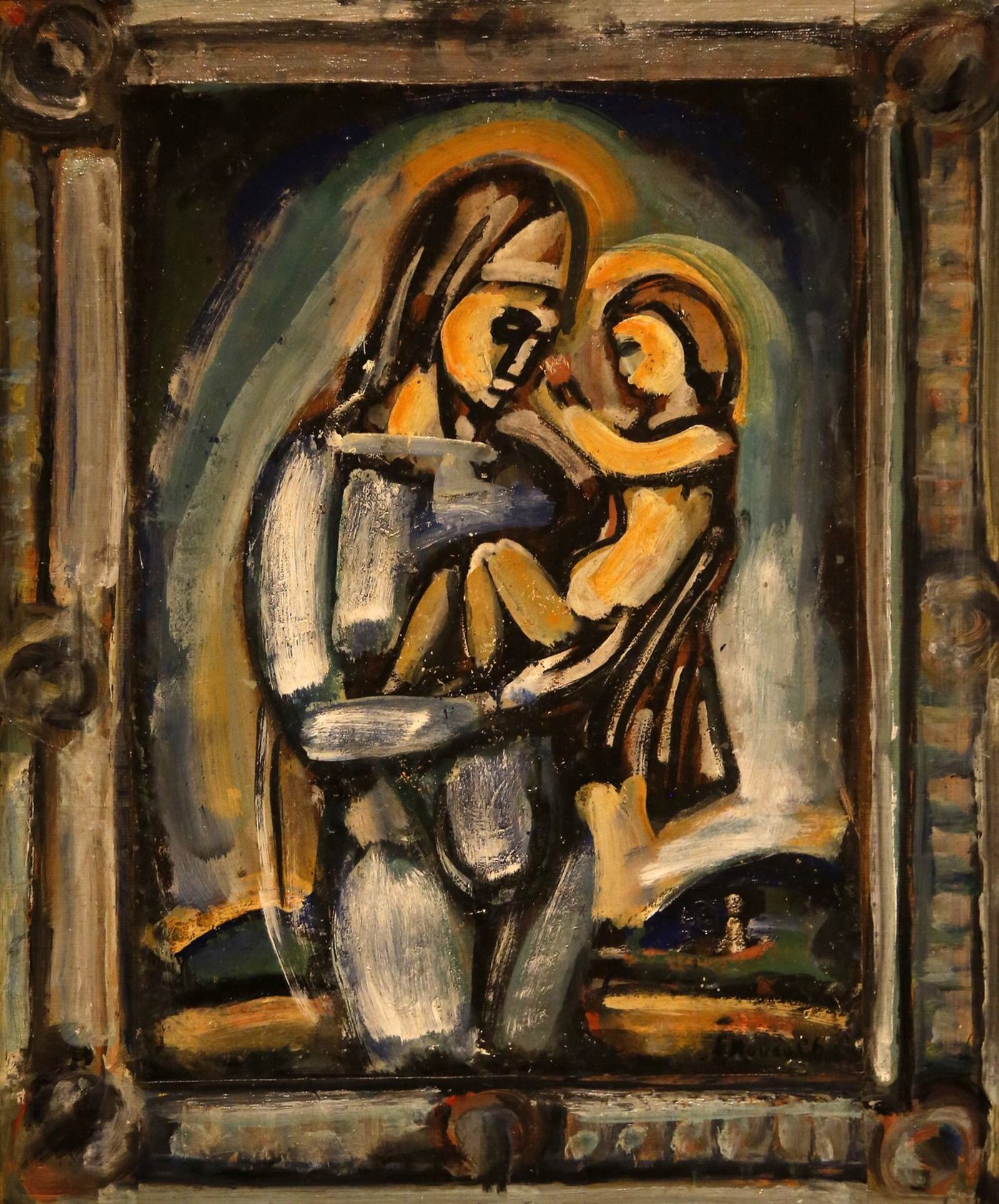 Our Lady Of The Fields No. 4 by George Rouault. The French artist uses abstraction to tell the classical story of The Madonna and Christ Child said Smith who described the painting as “a tender moment with a human story being told.” LISA POWELL / STAFF