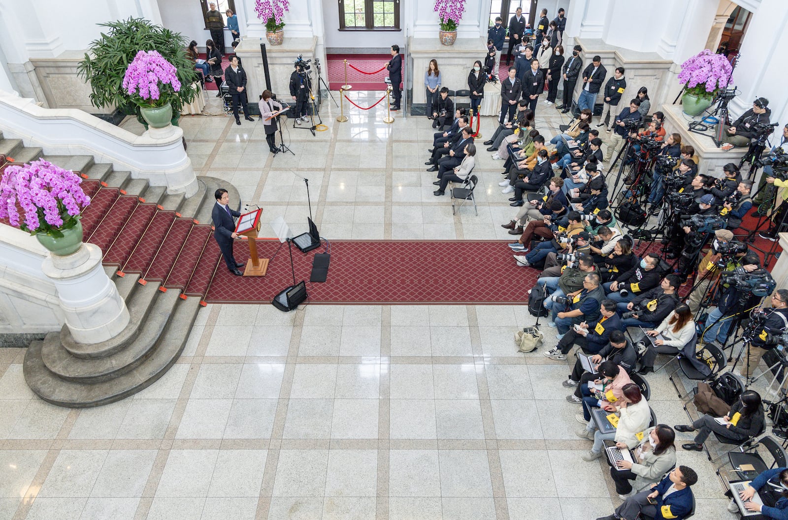 In this photo released by the Taiwan Presidential Office, Taiwan's President Lai Ching-te speaks at a press conference after a security meeting about U.S. President Trump's tariffs on trade partners and semiconductors at the Presidential office in Taipei, Friday, Feb. 14, 2025. (Taiwan Presidential Office via AP)