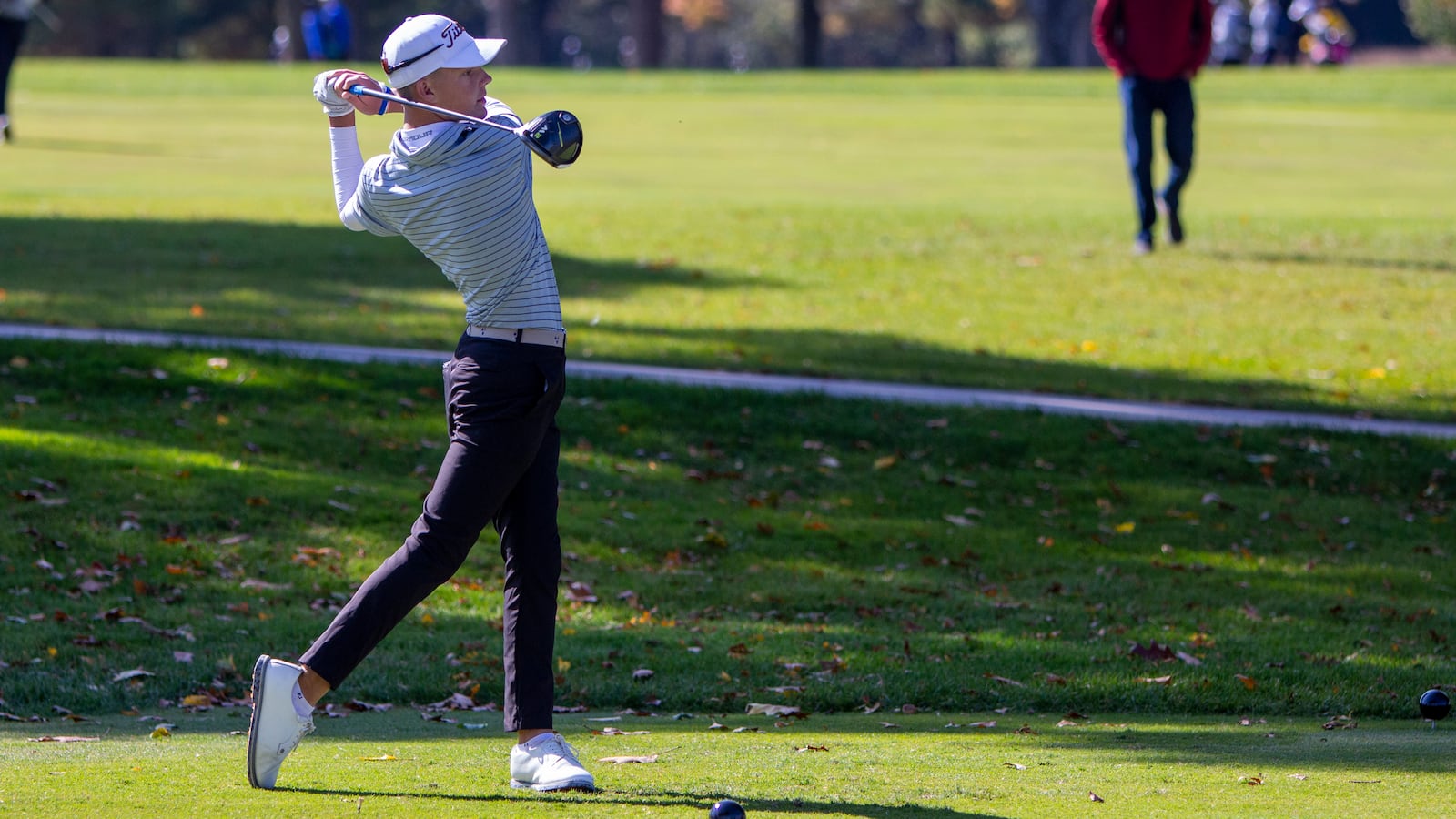 Alter sophomore T.J. Kreusch hits a tee shot during the Saturday's second round of the Division II state tournament at the Ohio State Scarlet Course. CONTRIBUTED/Jeff Gilbert