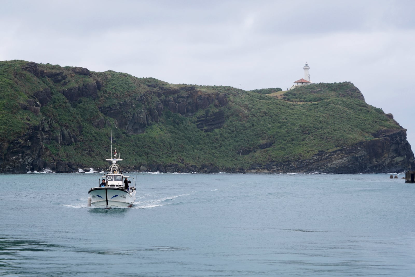 A fishing boat returns from a catch on Yonaguni, a tiny island on Japan’s western frontier, Friday, Feb. 14, 2025. (AP Photo/Ayaka McGill)