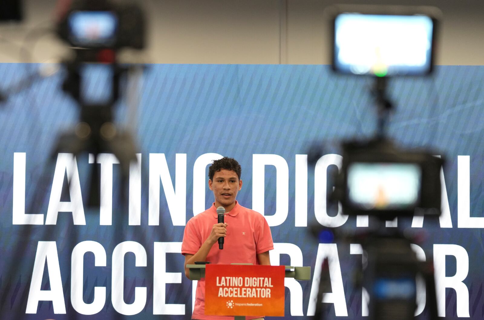 Dylan Pravia, a student at Florida International University, speaks during a Hispanic Federation event in Miami, Tuesday, Jan. 28, 2025, where the organization announced a new investment from a company, to help Latinos learn digital skills. (AP Photo/Lynne Sladky)