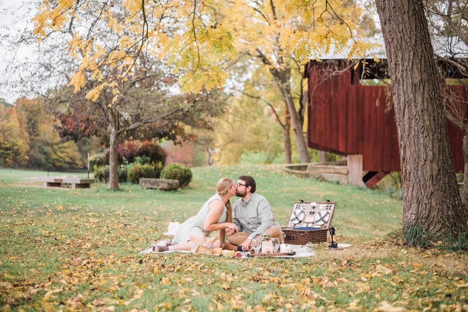 Couple kissing at a covered bridge in Fairfield County, Ohio.