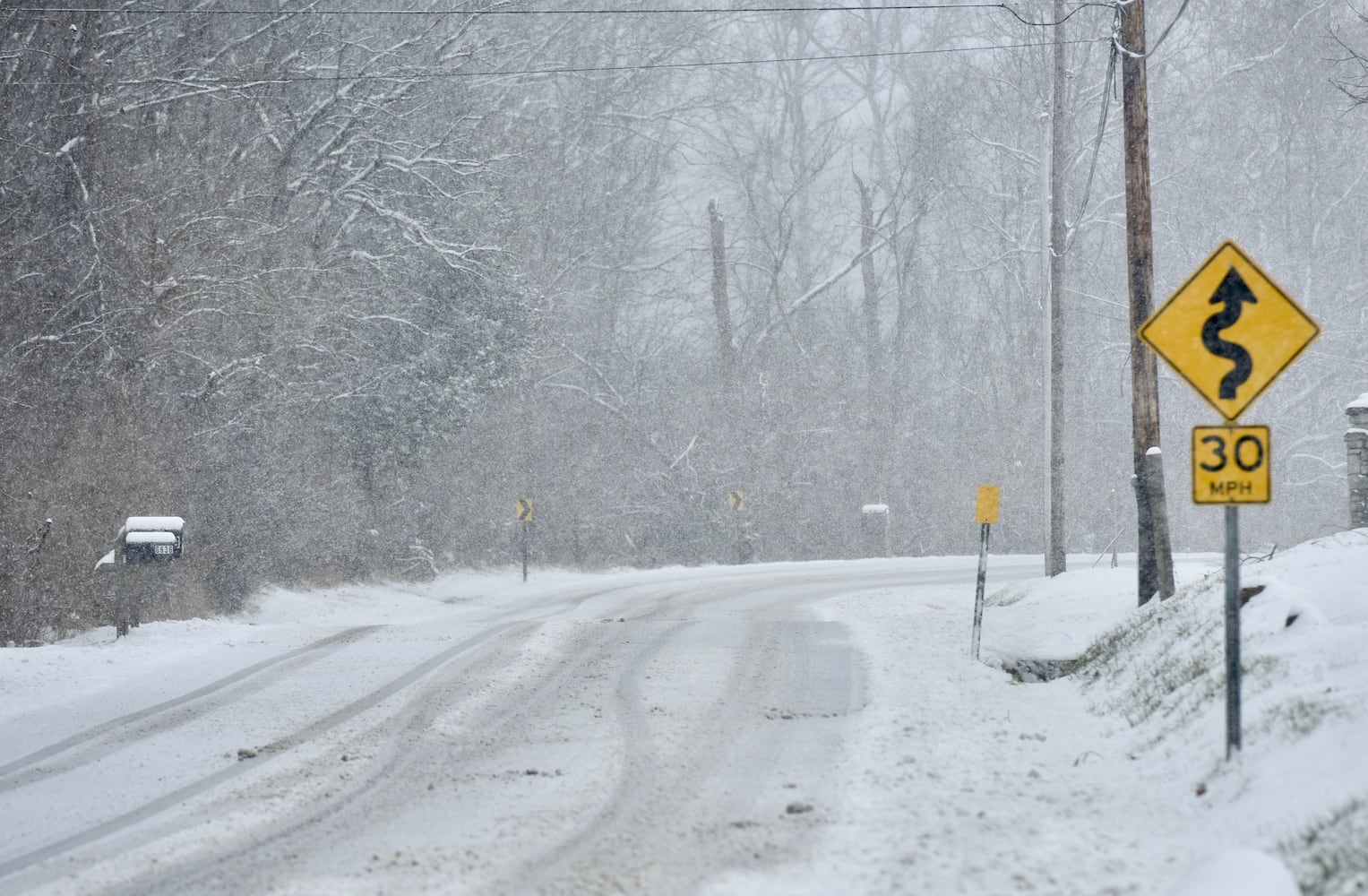 PHOTOS: Snowstorm covers region Saturday