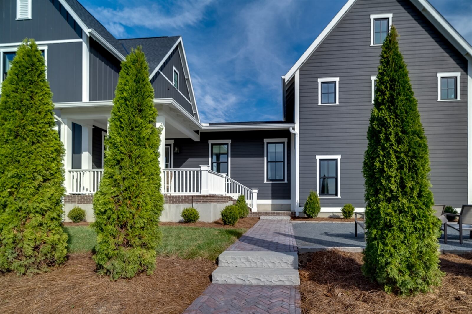 Built on a corner lot, the home’s design embraces the large porch concept with a wrap-around front porch and a covered side porch. CONTRIBUTED PHOTO