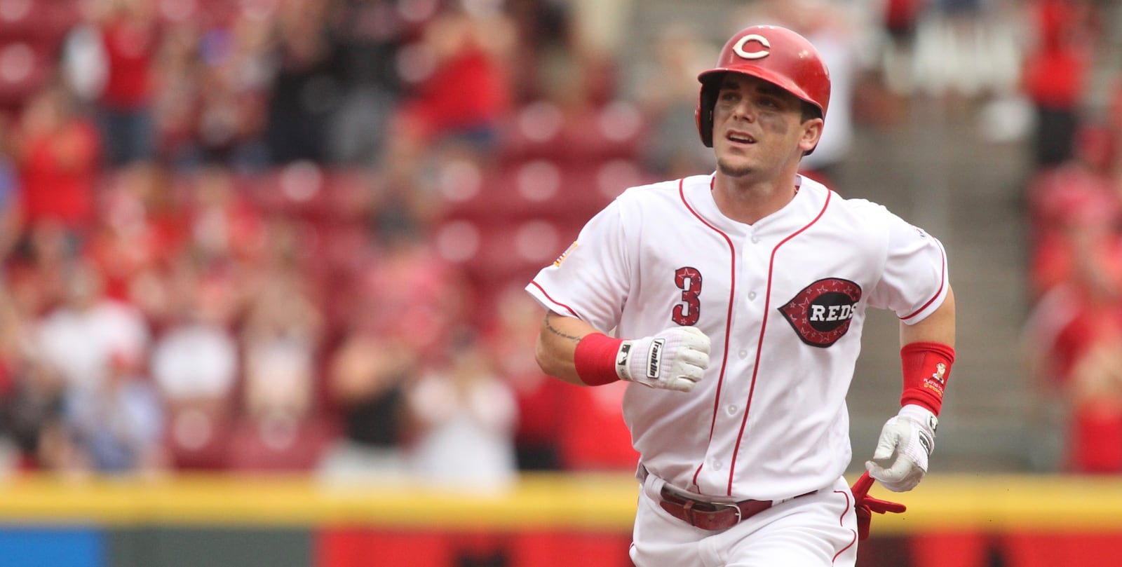 The Reds Scooter Gennett rounds the bases after a two-run home run against the White Sox on Tuesday, July 3, 2018, at Great American Ball Park in Cincinnati. David Jablonski/Staff