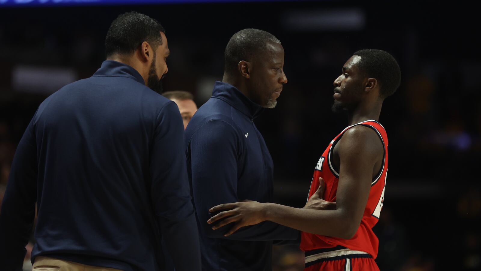 Dayton's Anthony Grant talks to Kobe Elvis during a game against Virginia Commonwealth on Friday, Feb. 9, 2024, at the Siegel Center in Richmond, Va. David Jablonski/Staff