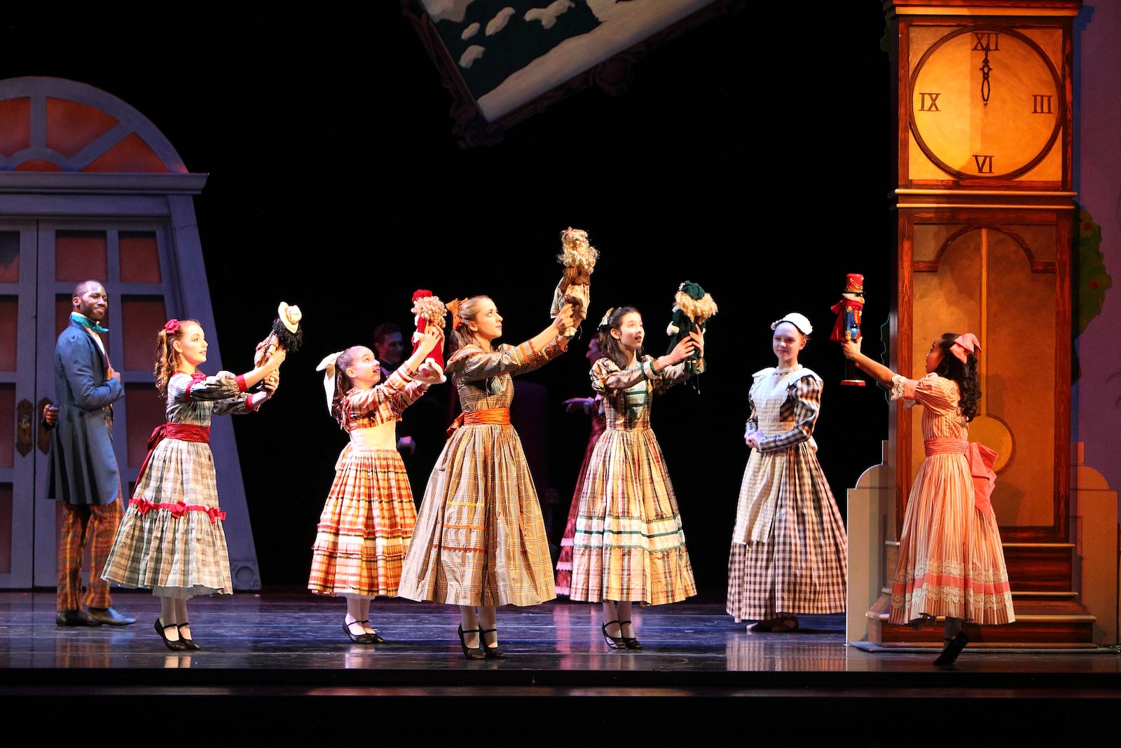 Clara admires her beautiful Nutcracker in Tchaikovsky’s "The Nutcracker.'' CONTRIBUTED