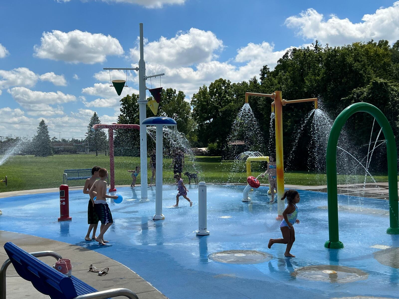 Visitors to Thomas Cloud Park cool off in the splash pad on Saturday. AIMEE HANCOCK/STAFF