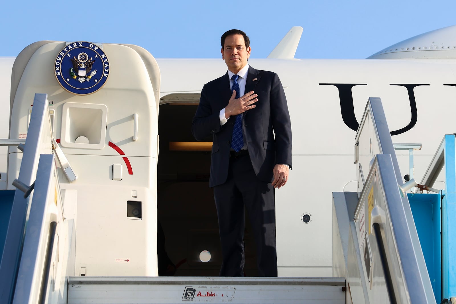 U.S. Secretary of State Marco Rubio waves as he departs Israel for Saudi Arabia, at Ben Gurion Airport in Tel Aviv, Israel, Monday, Feb. 17, 2025. (Evelyn Hockstein/Pool Photo via AP)