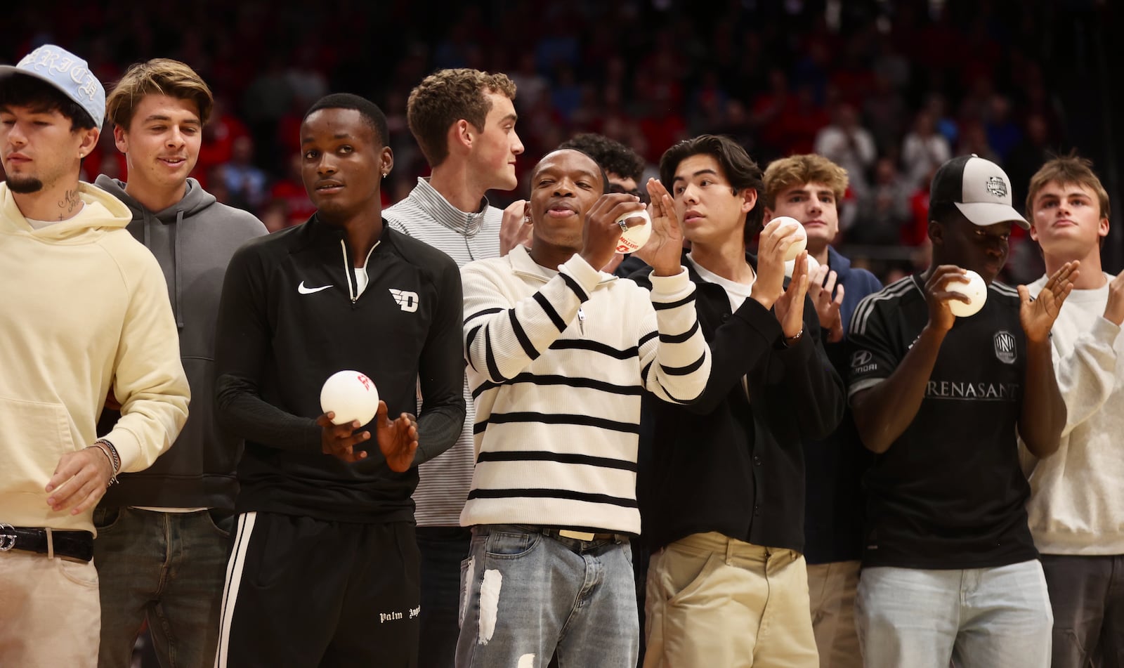 The Dayton men's soccer team is honored during the second half of a men's basketball game against New Mexico State on Wednesday, Nov. 20, 2024, at UD Arena. David Jablonski/Staff