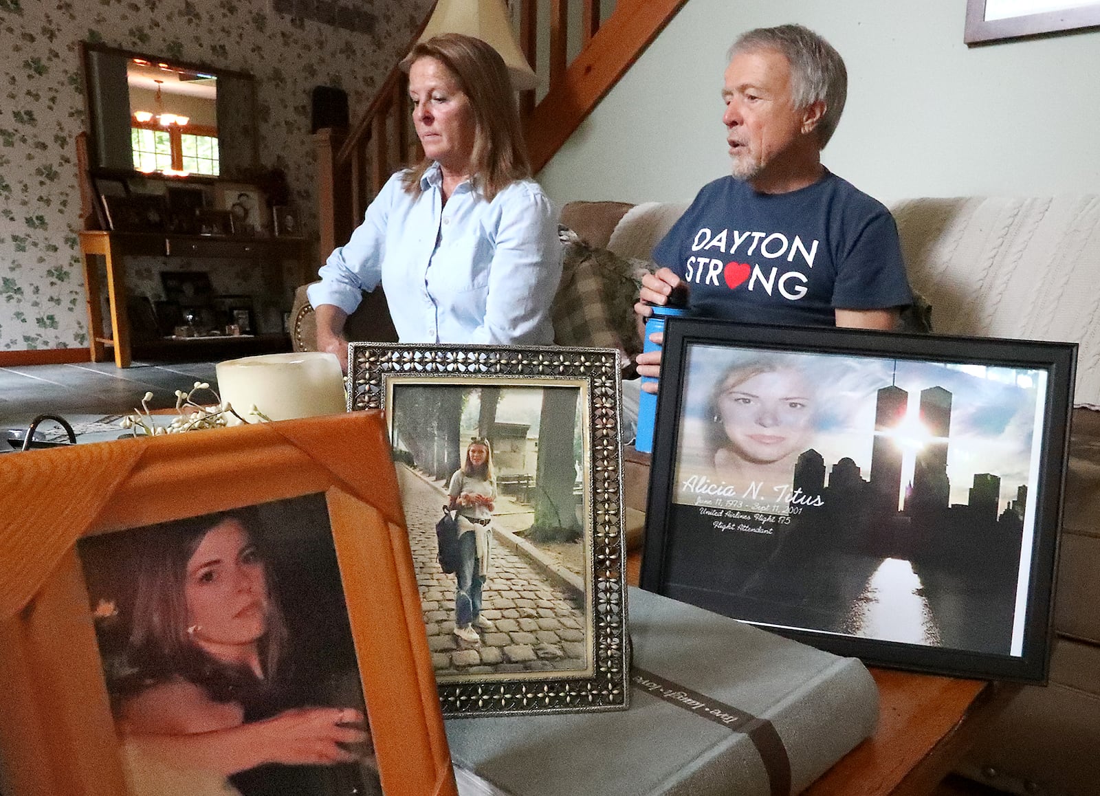 Bev and John Titus talk about their daughter, Alicia, who was a flight attendant on one of planes that struck the World Trade Center on 9/11. BILL LACKEY/STAFF