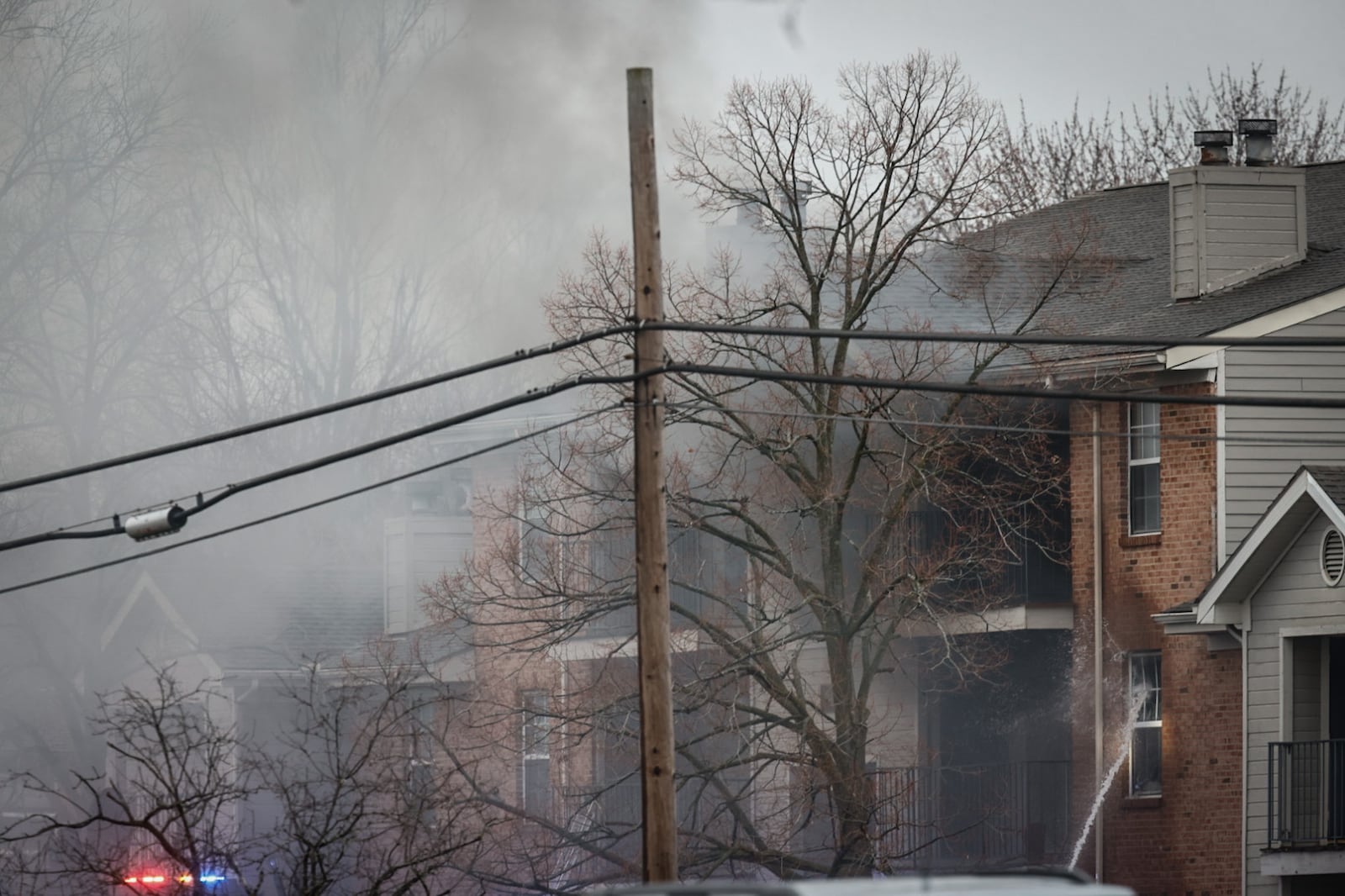 Law enforcement from multiple jurisdictions are involved in a standoff Friday, Dec. 20, 2024, at an apartment complex off Shiloh Springs Road in Trotwood. JIM NOELKER/STAFF