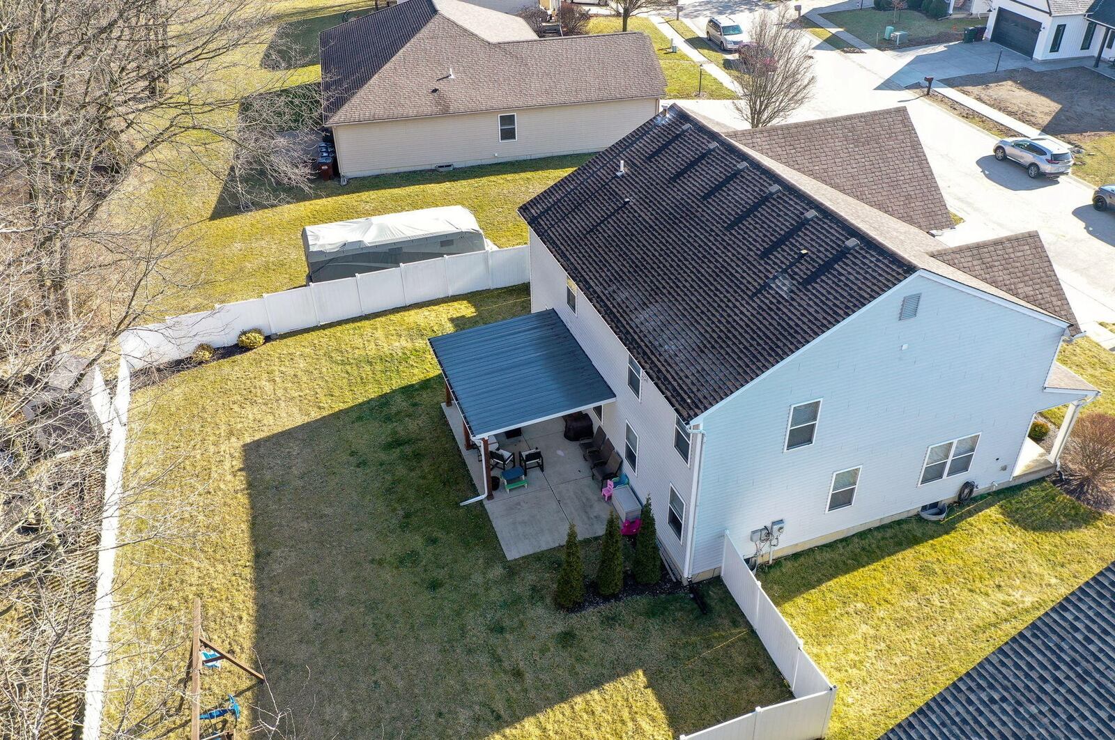 The back of the home is fully fenced with vinyl privacy and picket and backs up to a creek with no rear neighbors.