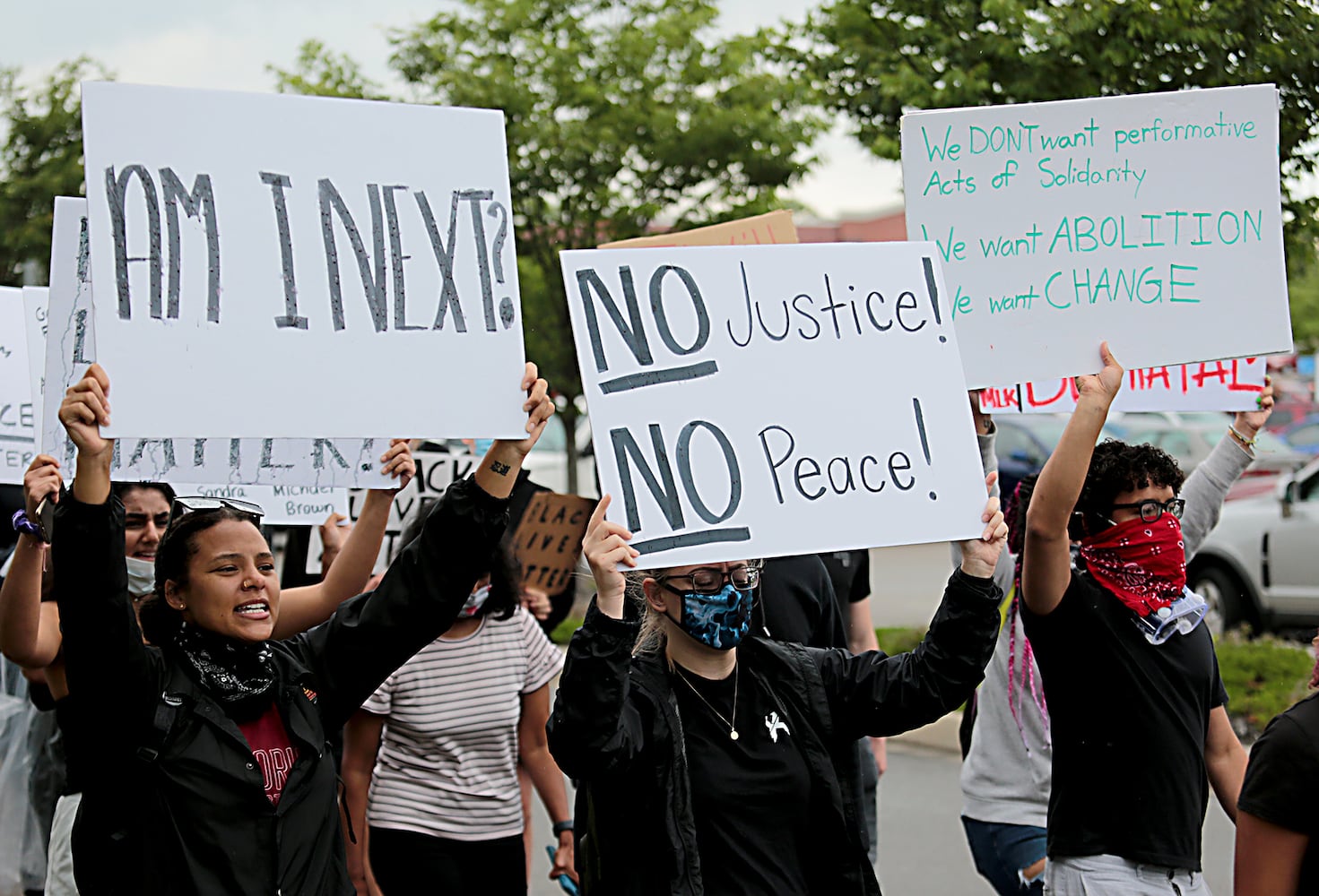 PHOTOS: Demonstrators rally for justice in Beavercreek