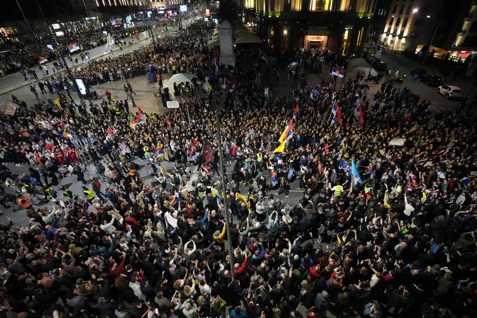 Protesters gather ahead of a major rally this weekend in downtown Belgrade, Serbia, Friday, March 14, 2025. (AP Photo/Darko Vojinovic)