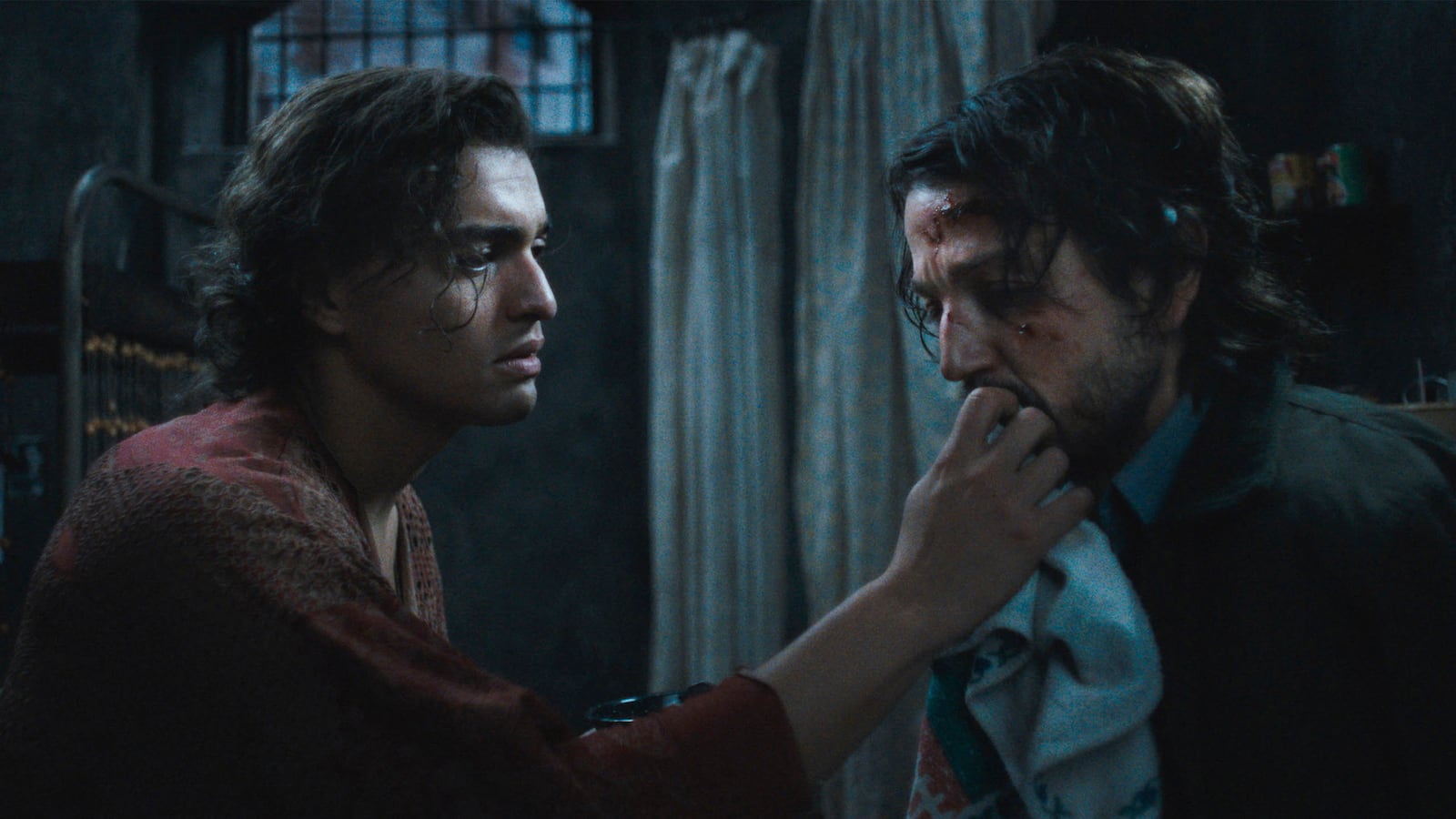 Tonatiuh, left, and Diego Luna appear in a scene from "Kiss of the Spider Woman" by Bill Condon, an official selection of the 2025 Sundance Film Festival. (Sundance Institute via AP)