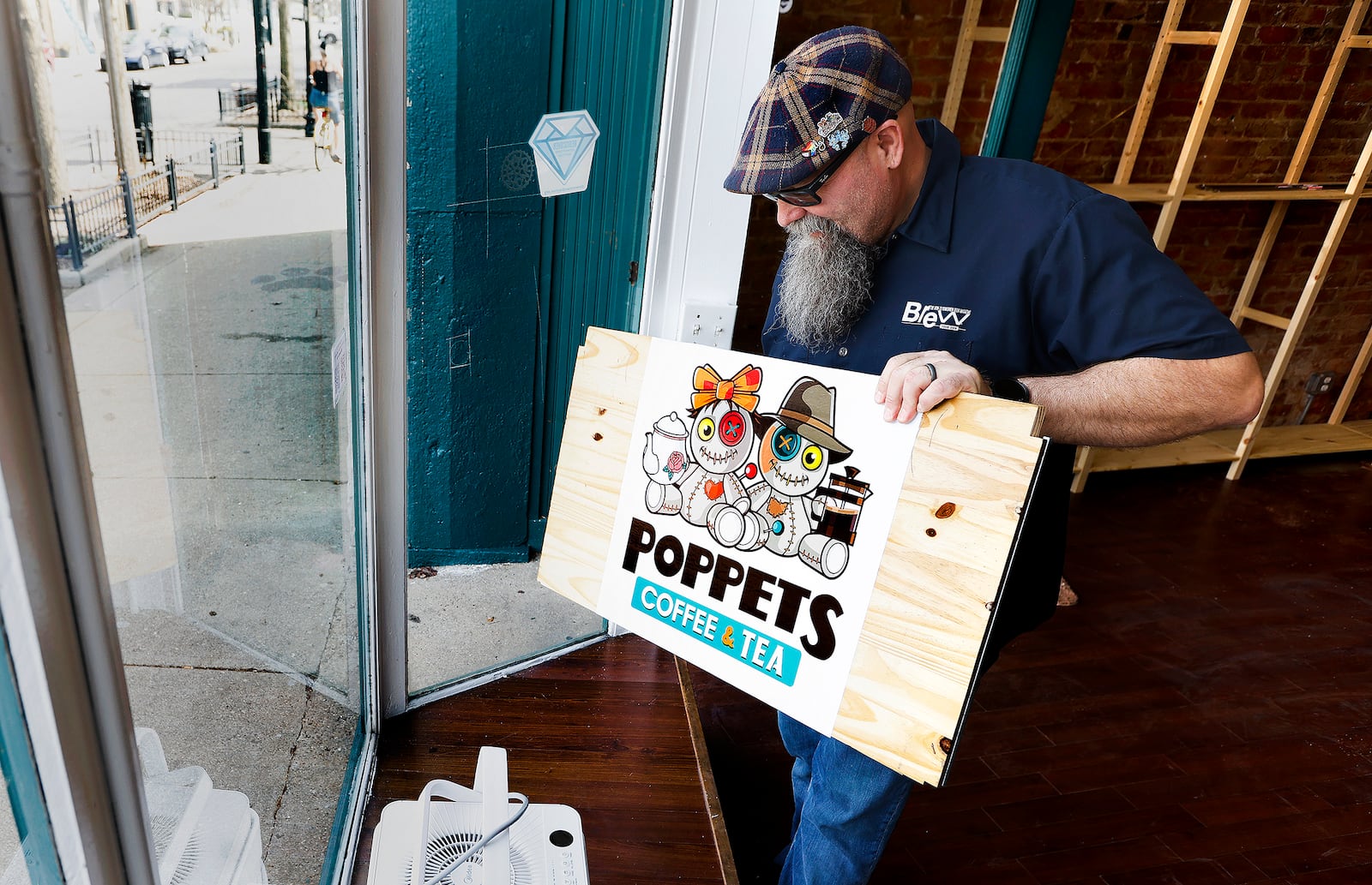 Poppets Coffee & Tea hopefully will open at 510 E. Fifth St. in the Oregon District next month, said Michael Thomas, who owns the business with his wife, Karen. Poppets already has a space in the 2nd Street Market, which will remain in operation. CORNELIUS FROLIK / STAFFMARSHALL GORBY\STAFF