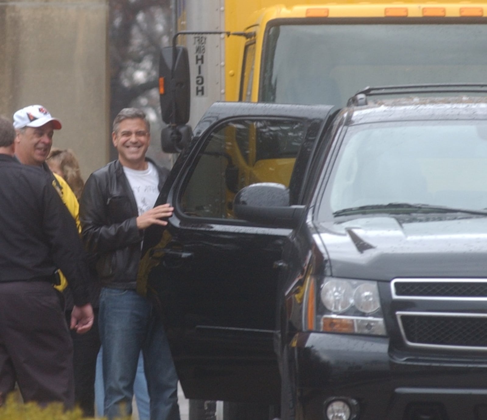 George Clooney leaves out the back of Hall Auditorium after wrapping filming in Oxford on his film "The Ides of March" Friday, March 4. Staff photo by Meagan Engle