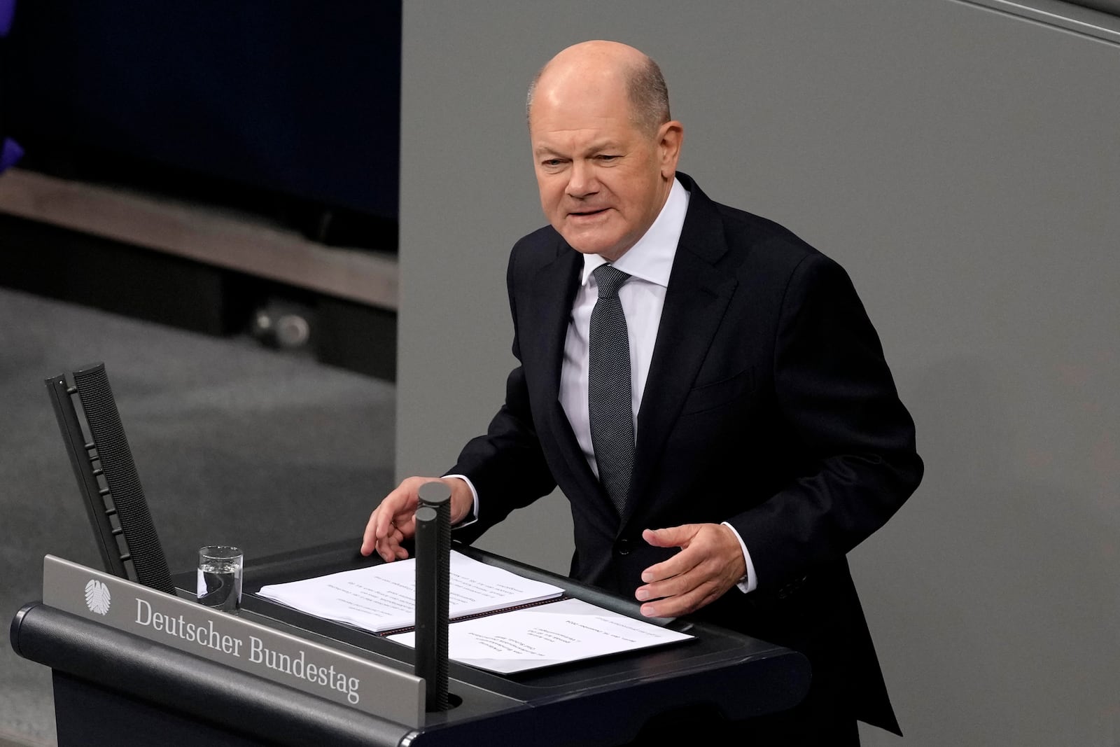 German Chancellor Olaf Scholz speaks during a plenary session at the German parliament Bundestag where he faces a vote of confidence, Berlin, Germany, Monday, Dec. 16, 2024. (AP Photo/Markus Schreiber)