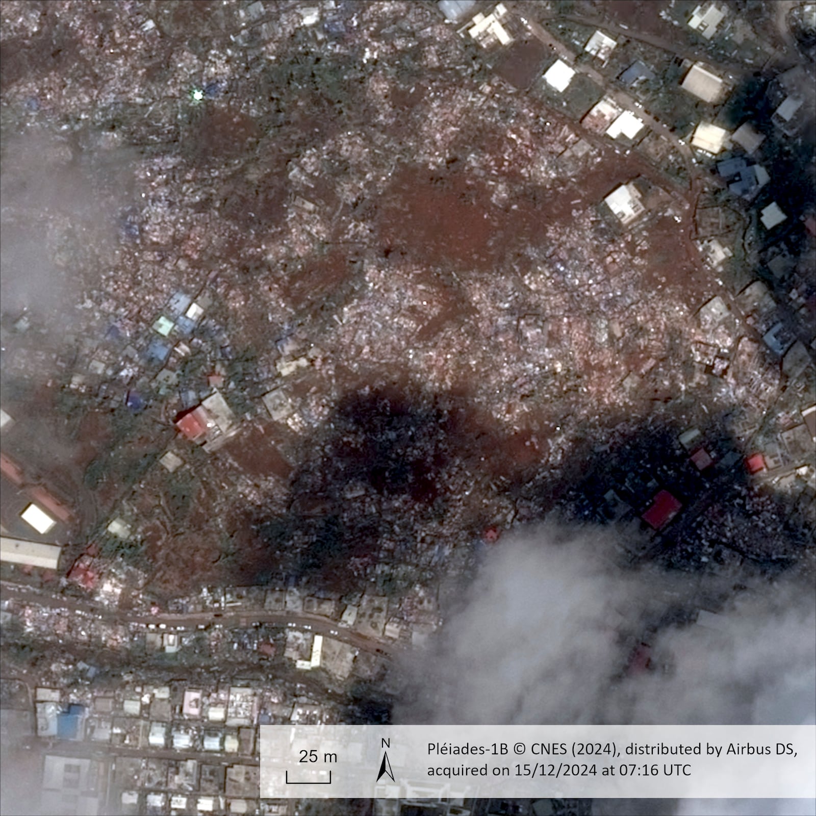 This satellite photo provided Wednesday Dec.18, 2024 by the Centre National d'Etudes Spatiales (CNES) shows Doujani in the Indian Ocean the French territory of Mayotte, on Dec. 15, 2024, after the cyclone Chido. (CNES distributed by Airbus DS via AP)