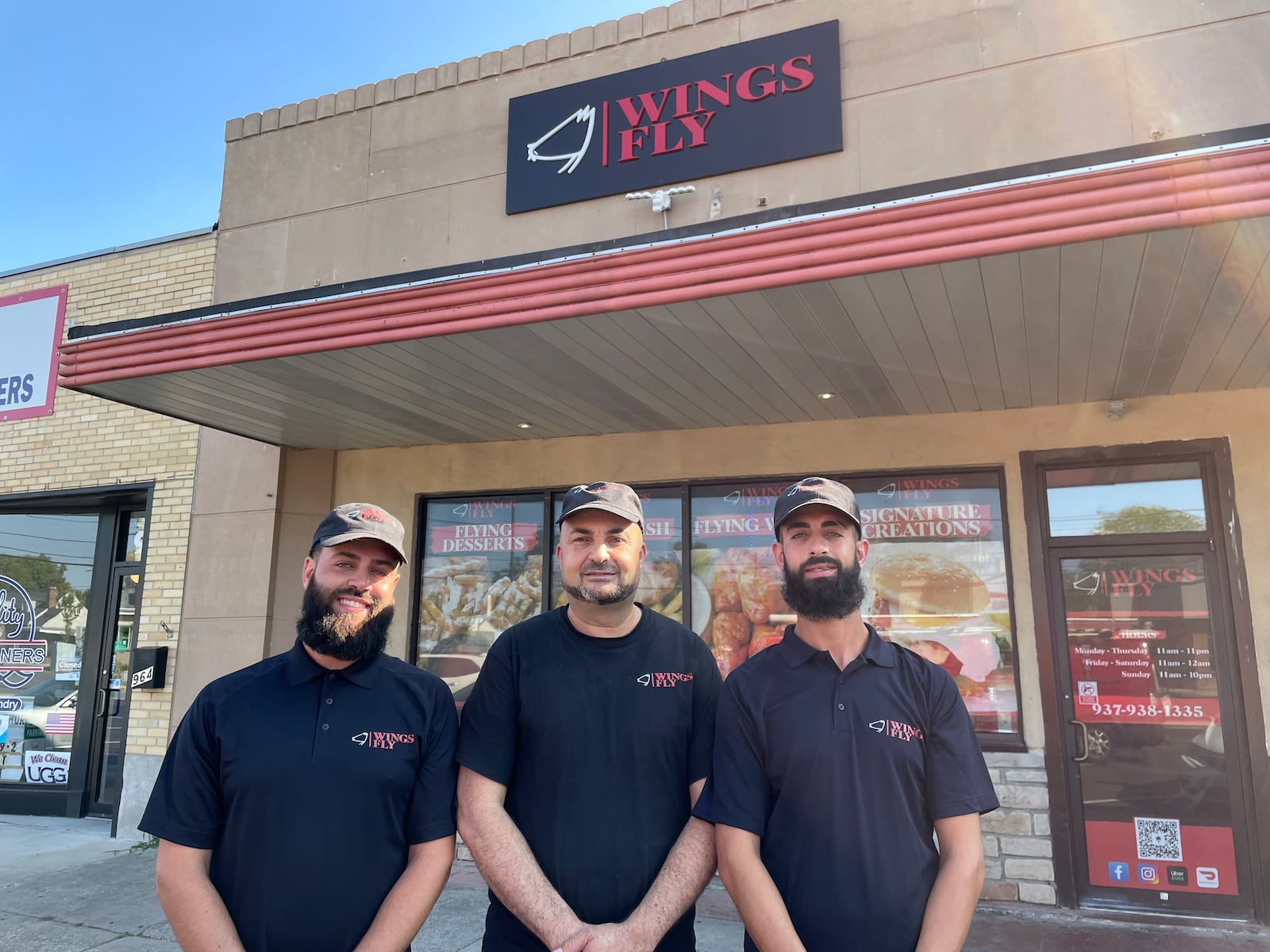 Wings Fly is located at 960 Patterson Road in Dayton. Pictured left to right is Laith Melhem, Sami Jamhour and Ismail Melhem. NATALIE JONES/STAFF