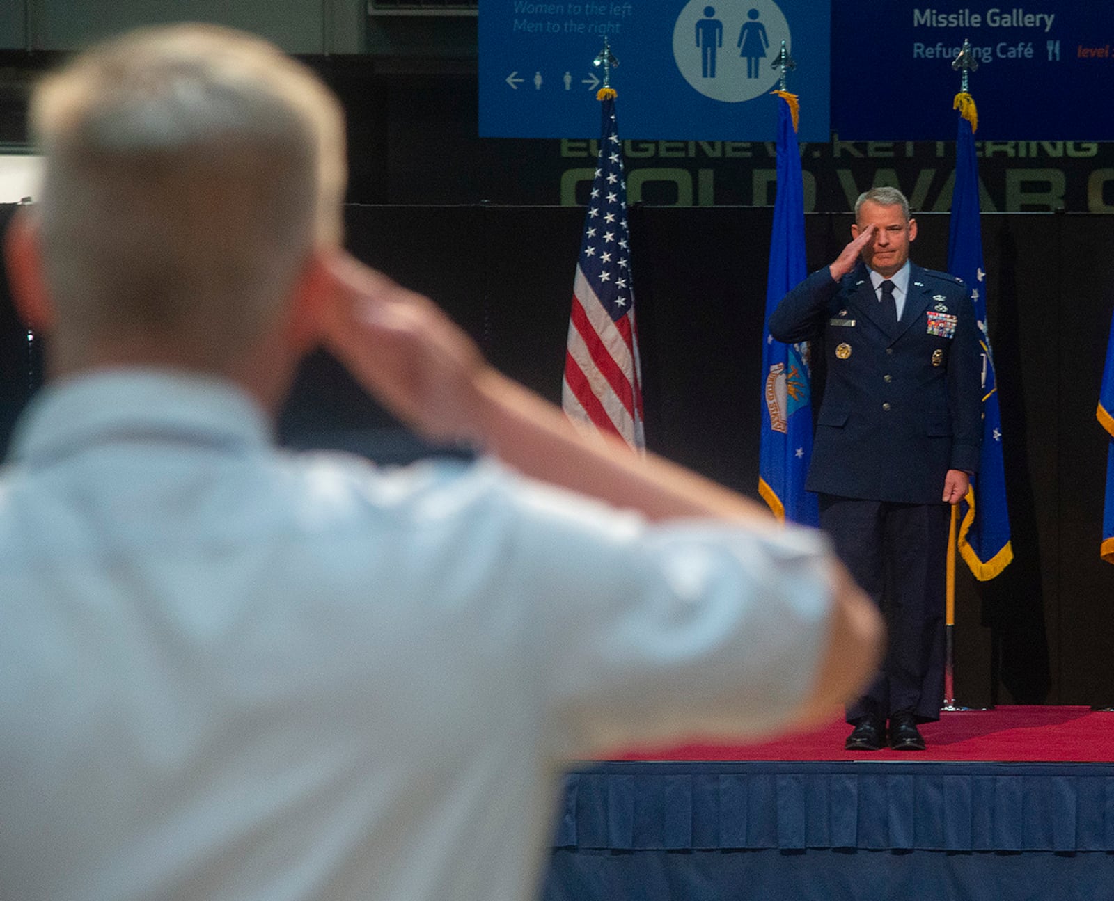 Col. Christopher Meeker receives his first salute as 88th Air Base Wing and installation commander during a change of command ceremony July 7, 2022 inside the National Museum of the U.S. Air Force. Meeker assumed command from Col. Patrick Miller, who served in the position for two years. U.S. AIR FORCE PHOTO/SENIOR AIRMAN JACK GARDNER